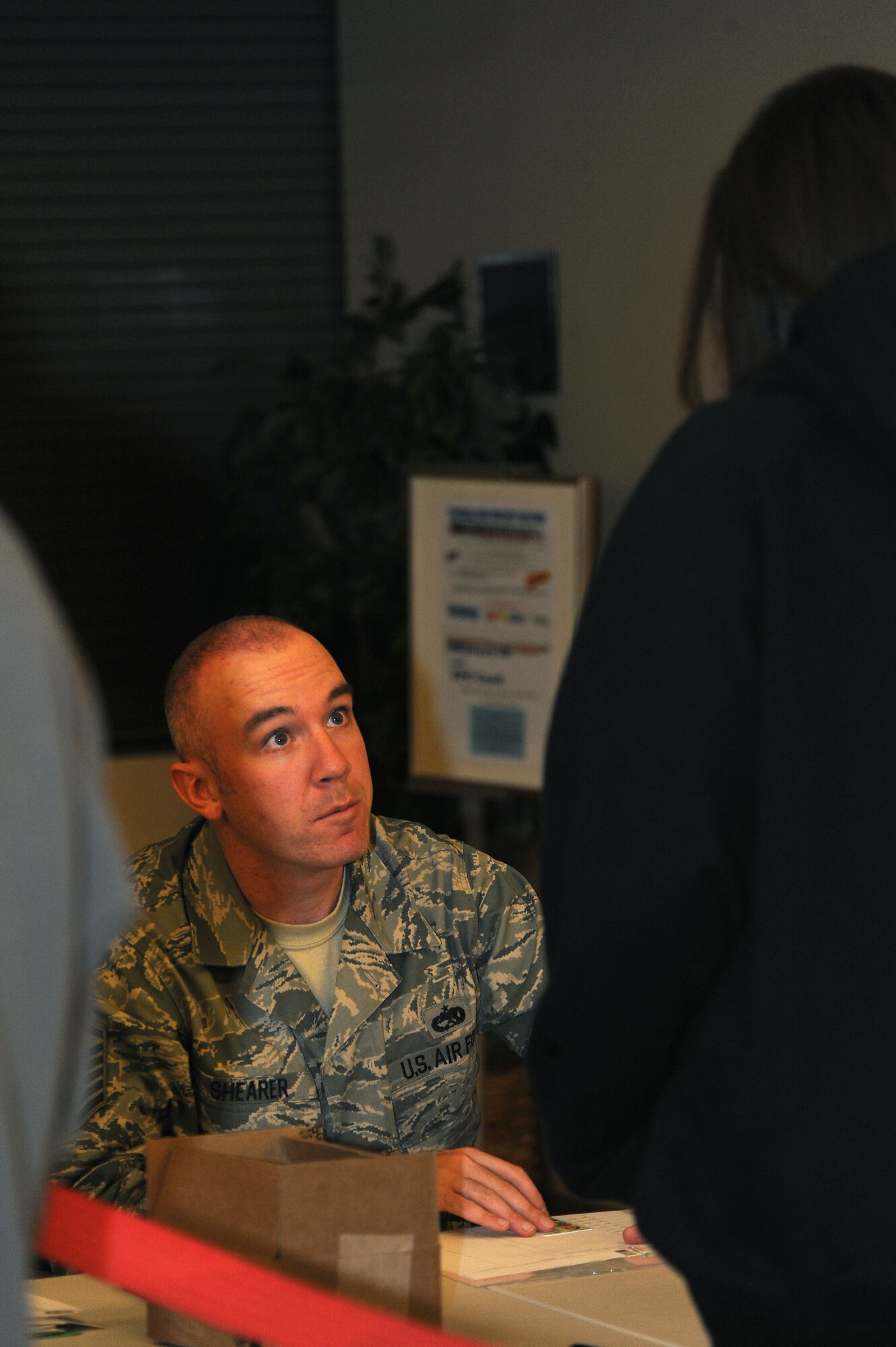 MINOT AIR FORCE BASE, N.D. -- Master Sgt. Aaron Shearer, 5th Aircraft Maintenance Squadron assistant first sergeant, verifies information with an Airman during Operation Prairie Hawk here Oct. 10. First sergeants from both the 5th Bomb Wing and the 91st Missile Wing in partnership with the Drug Demand Reduction Office, Air Force Office of Special Investigations and Judge Advocate General office conducted the sweep to present a clear deterrent to drug use. The ordered sweep is crucial to ensuring Airmen are fit for duty and key to meeting uncompromising adherence to all directives. (U.S. Air Force photo by Tech. Sgt. Lee A. Osberry Jr.)