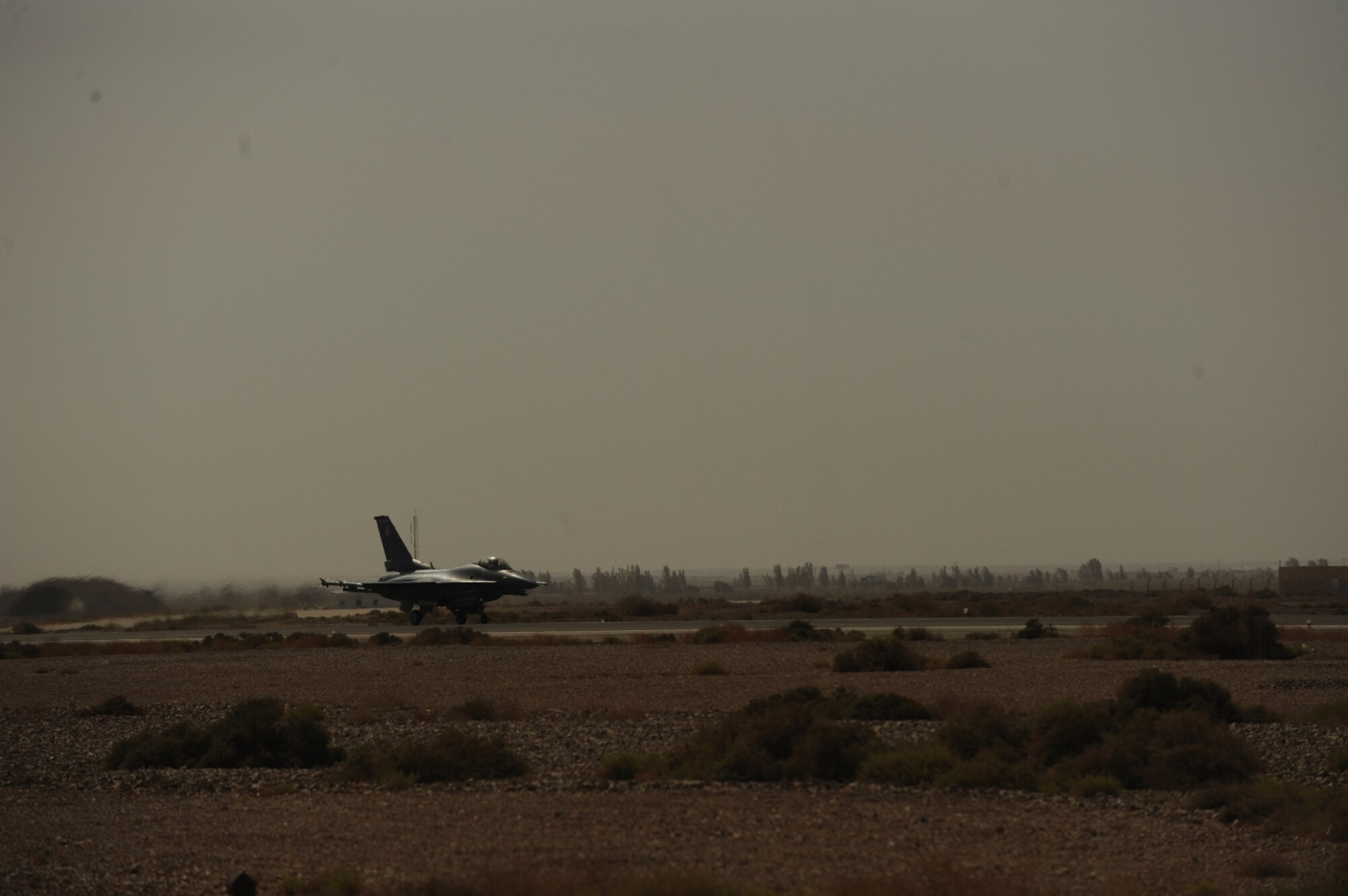 A U.S. Air Force F-16 Fighting Falcon from the 77th Fighter Squadron takes off as part of The Falcon Air Meet 2010 at Azraq Air Base, Jordan, Oct. 18, 2010.  The purpose of The Falcon Air Meet is to improve international military relations and joint air operations.  (U.S. Air Force Photo/Staff Sgt. Eric Harris) (RELEASED)