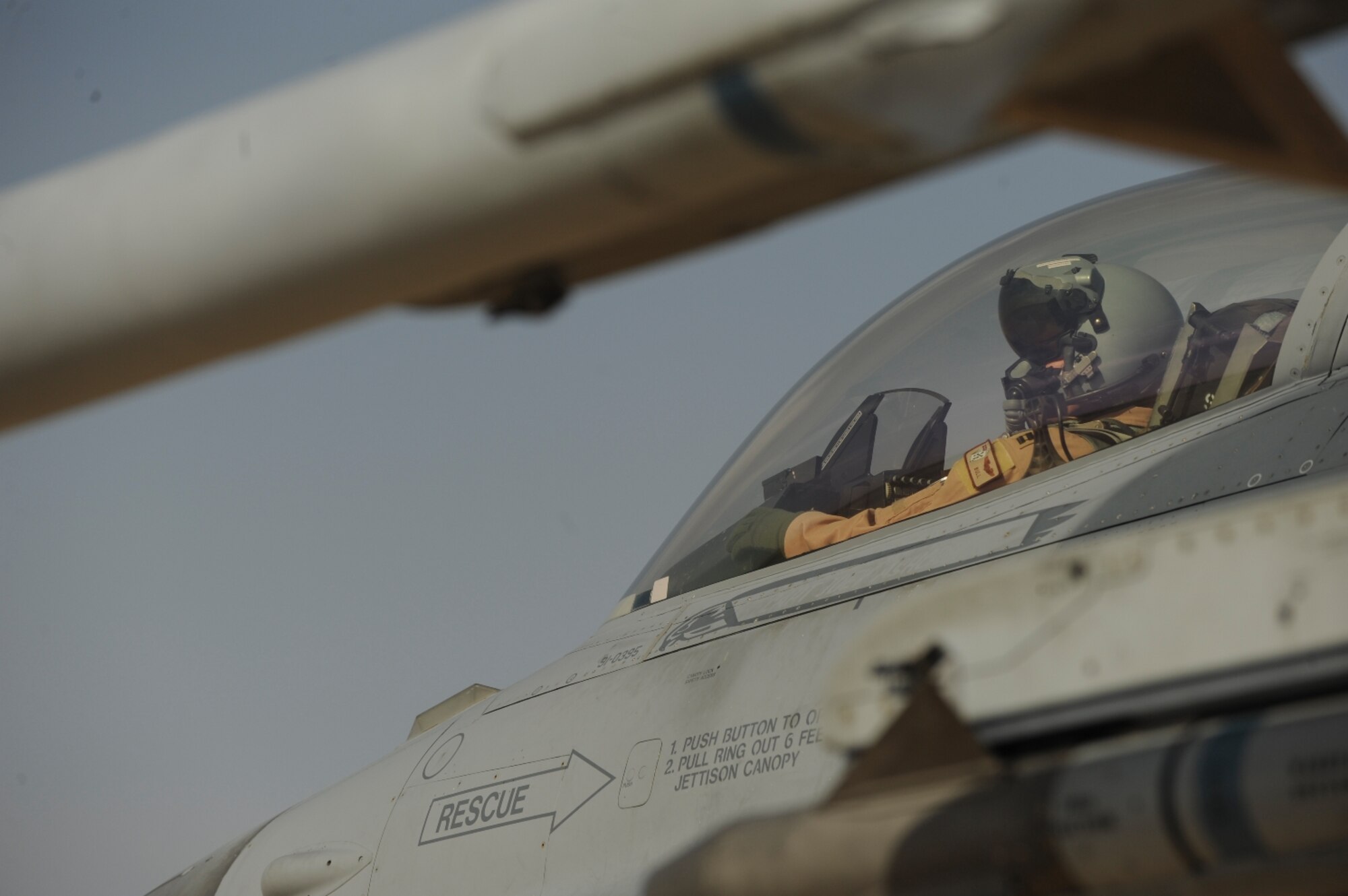 U.S. Air Force Capt. Bailyn Beck, a native of Tampa, Fla., prepares an F-16 Fighting Falcon for takeoff as part of The Falcon Air Meet 2010 at Azraq Air Base, Jordan, Oct. 18, 2010.  Capt. Beck is assigned to the 77th Fighter Squadron from Shaw Air Force Base, S.C.  (U.S. Air Force Photo/Staff Sgt. Eric Harris) (RELEASED)