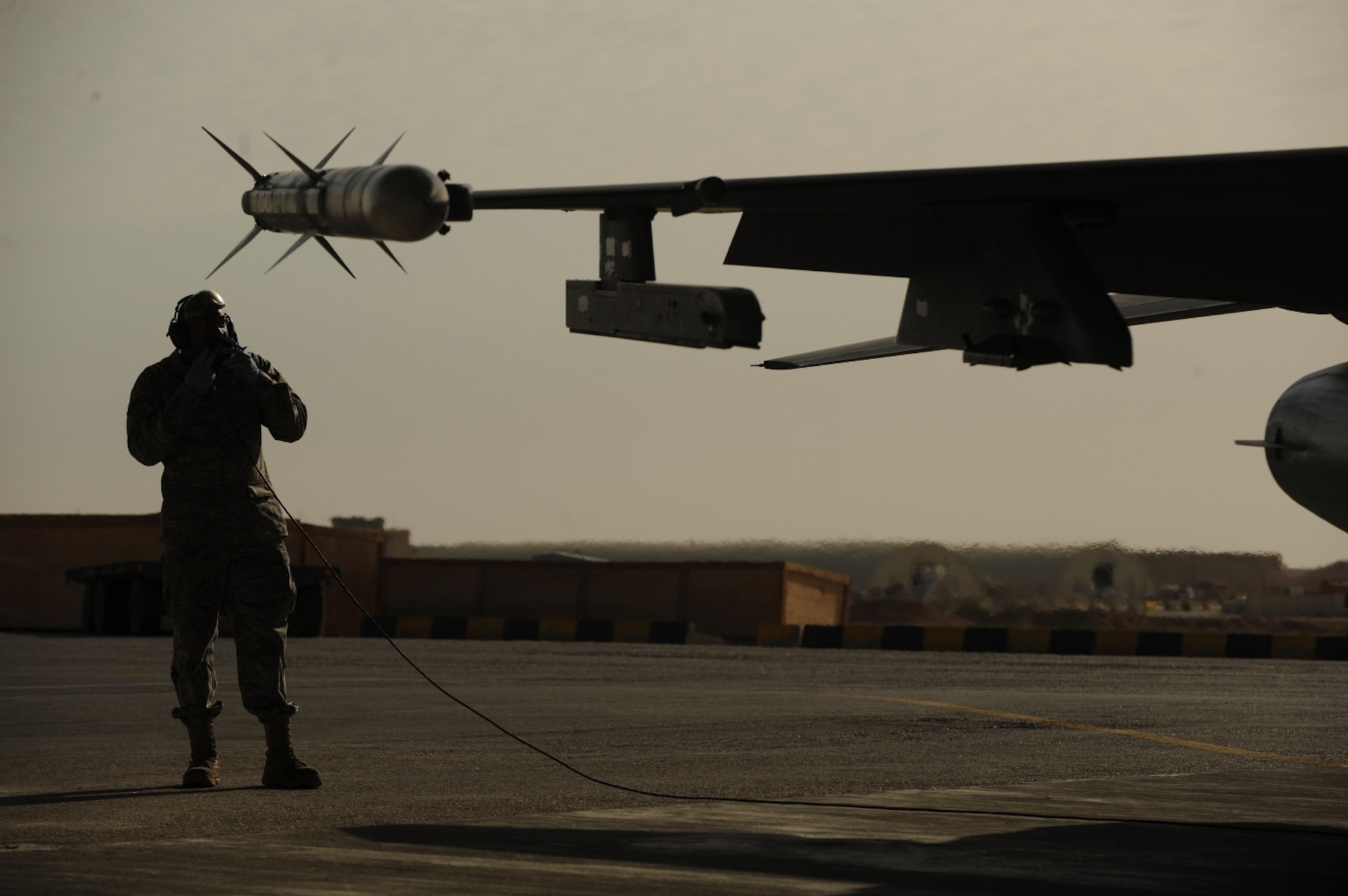 U.S. Air Force Airman 1st Class James King, a native of Granite City, Ill., conducts pre-flight checks on an  F-16 Fighting Falcon as it prepares for takeoff as part of The Falcon Air Meet 2010 at Azraq Air Base, Jordan, Oct. 18, 2010.  Airman King is assigned to the 77th Aircraft Maintenance Unit from Shaw Air Force Base, S.C.  (U.S. Air Force Photo/Staff Sgt. Eric Harris) (RELEASED)