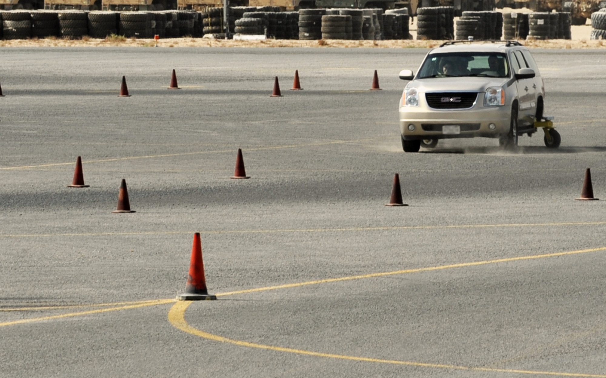 SOUTHWEST ASIA -- A student employs a skid-control technique while maneuvering a training vehicle Oct. 12 at the Army Safe Driver Training here. The vehicle's rear tires are mounted to special airplane wheels that instructors can rotate 360 degrees on command, inducing spins that students must control. The ASDT has trained more than 15,500 U.S. and host-nation military members since opening in late 2005. (U.S. Air Force photo by Senior Airman Laura Turner)