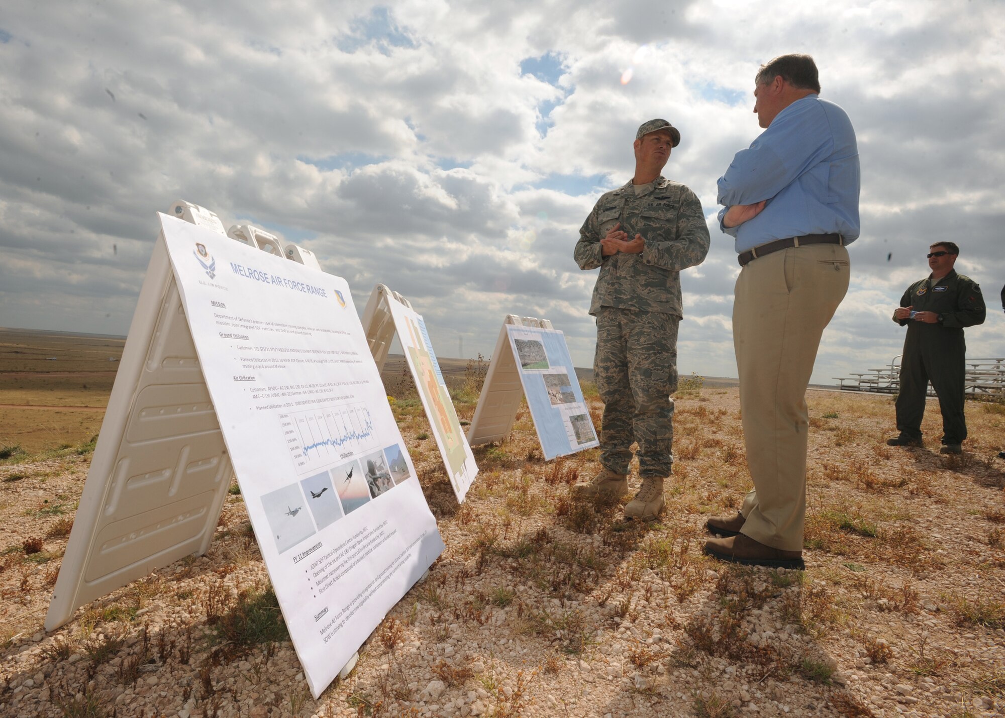 Maj. Michael Janssen, 27th Special Operations Wing range plans officer, explains to Secretary of the Air Force Michael Donley the training and exercises that take place at the Melrose Air Force Range. The Air Force secretary visited the range and Cannon Air Force Base, N.M. Oct. 13. (U.S. Air Force photo by Senior Airman Maynelinne De La Cruz)