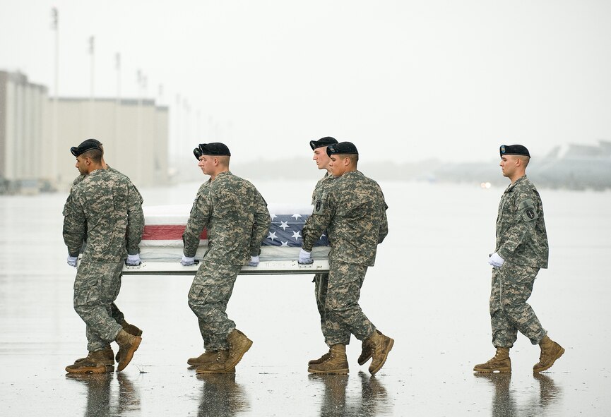 A U.S. Army Carry Team, transfers the remains of Army Spc. Donald S. Morrison of Cincinnati, at Dover Air Force Base, Del., Sept. 27, 2010. Morrison was assigned to 20th Engineer Battalion, 36th Engineer Brigade, Fort Hood, Texas. (U.S. Air Force photo/Jason Minto)