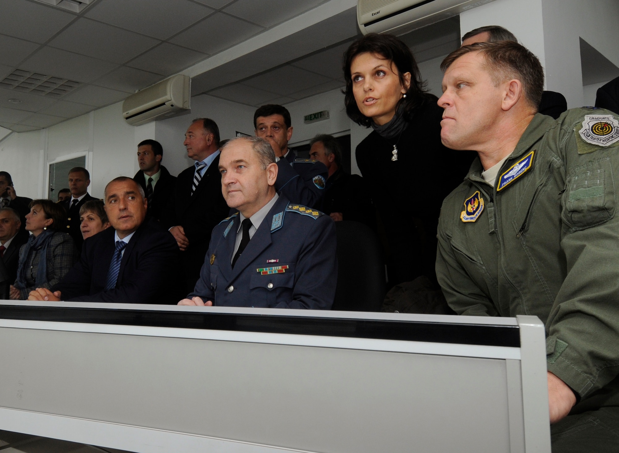 GRAF IGNATIEVO AIR FORCE BASE, Bulgaria - Seated from right to left, Lt. Gen. Frank Gorenc, 3rd Air Force commander; Gen. Simeon Simeonov, Bulgarian Chief of Defense; and Bulgarian Prime Minister Boyko Borisov watch an aerial demonstration of the Bulgarian air force's capabilities during Operation Thracian Star Oct. 14. The operation was a three-week combined exercise that gave both U.S. and Bulgarian Airmen the opportunity to train together and strengthen relationships (U.S. Air Force photo/Staff Sgt. Benjamin Wilson)