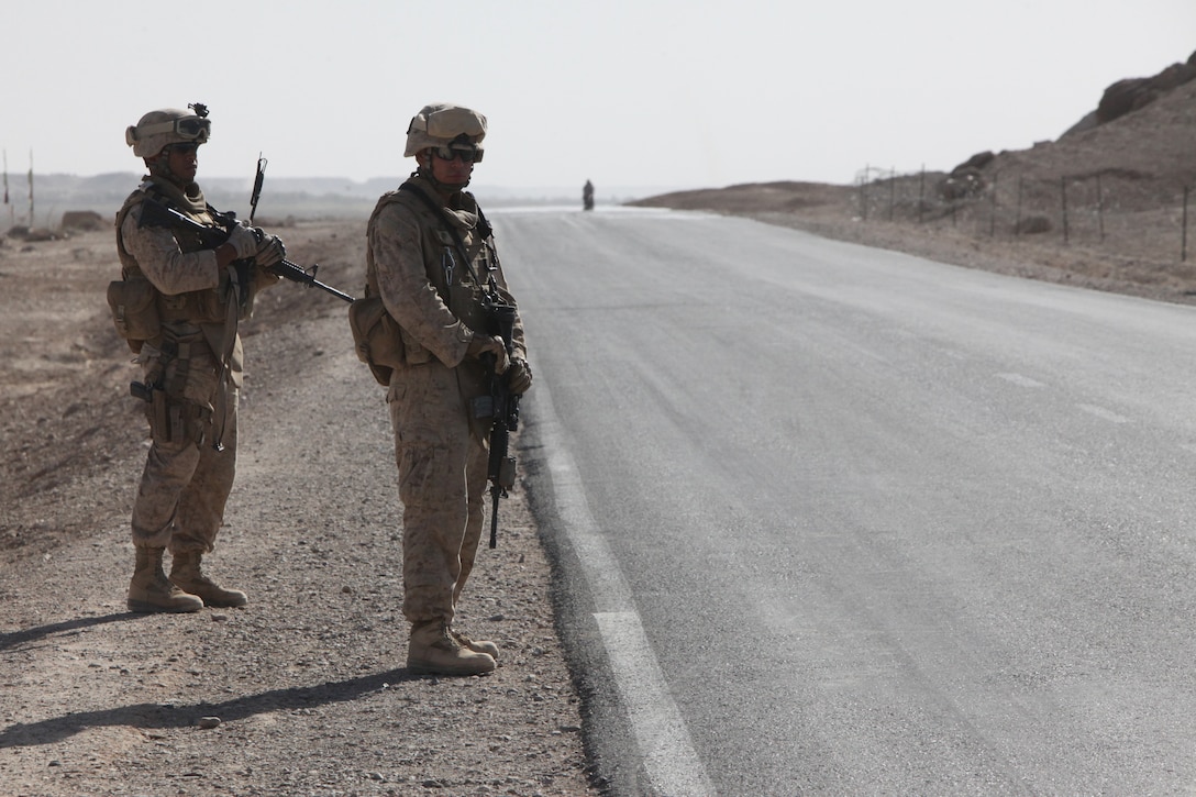 Marines with Bravo Company, Combat Logistics Battalion 2, 1st Marine Logistics Group (Forward) prepare to conduct vehicle checkpoint operations on Route 606 in Demazong, Afghanistan, Oct. 18. Marines and Afghan soldiers checked vehicles passing by for contraband, including improvised explosive devices and materials used to make IEDs, the Taliban’s weapon of choice against coalition forces.