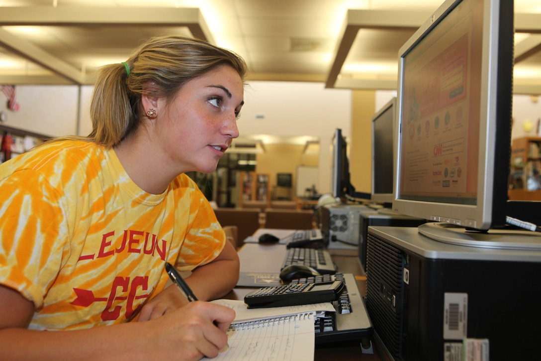 Tayler Snipes, a senior at Lejeune High School, uses Tutor.com to get help with her calculus homework at LHS aboard Marine Corps Base Camp Lejeune, recently.  Military dependents in grades kindergarten through 12th grade and service members enrolled in community colleges are logging onto Tutor.com to get some extra help from professional tutors so they can excel in their studies.