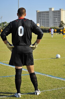 U.S. Navy Aviation Structural Mechanic Airman James Fenner, assigned to Helicopter Mine Countermeasures Squadron FOURTEEN, Norfolk, Va., USN soccer team goalkeeper, prepares to kick the ball during an Armed Forces Men's Soccer Championship Round Robin match at Morgan Sports Complex, Destin, Fla., Oct. 18, 2010. Each team conducted highly competitive training programs and trial camps in order to select the best players to represent their respective services. However, at the conclusion of the tournament, inter-service rivals will cast aside their differences. The top players from the tournament will be chosen to represent the US in the International Military Sports Competition.  (DoD photo by U.S. Air Force Senior Airman Sheila deVera/RELEASED)