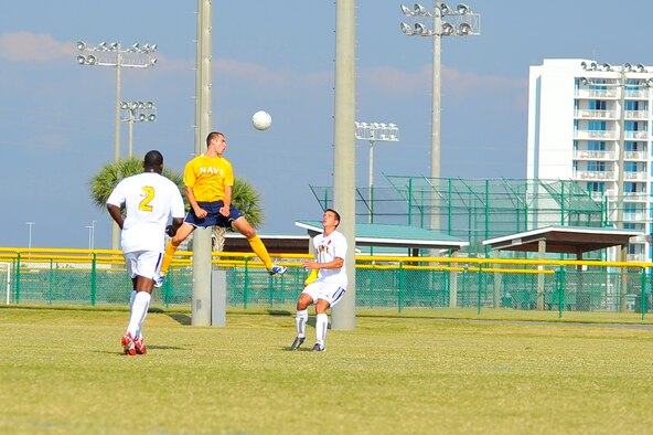 U.S. Navy Lt. j.g. Robert Leahy, assigned to Naval Medical Center, Portsmouth, Va., a USN soccer team forward, heads the ball during an Armed Forces Men's Soccer Championship Round Robin match against the U.S. Army at Morgan Sports Complex, Destin, Fla., Oct. 18, 2010. The Armed Forces Championships are conducted by the Armed Forces Sports council for the purpose of promoting, understanding, goodwill, and competition among the Armed Services.  (DoD photo by U.S. Air Force Senior Airman Sheila deVera/RELEASED)