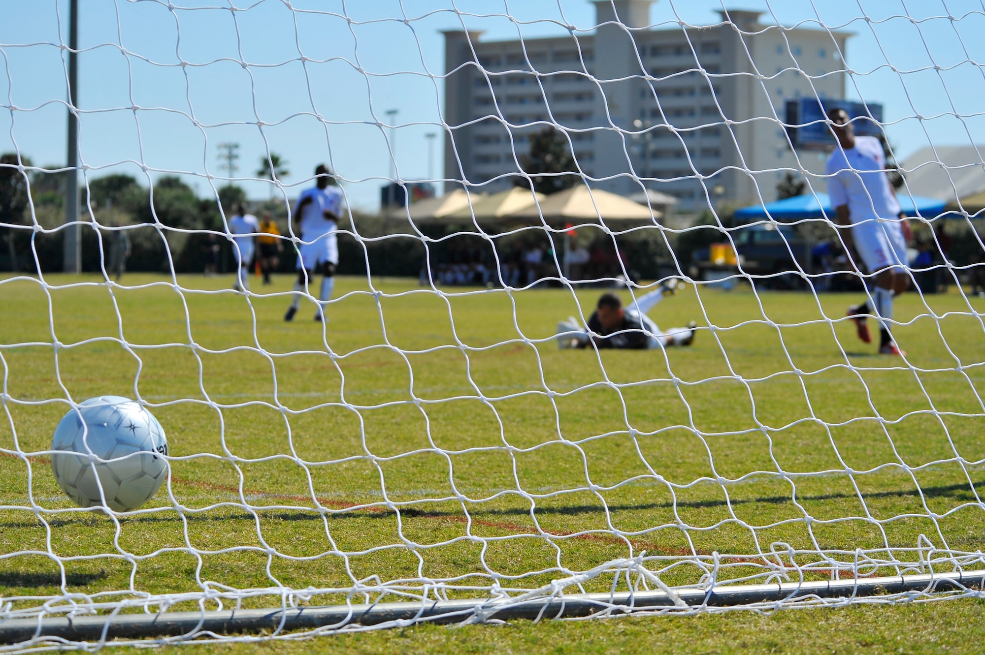 The U.S. Marine Corps soccer team reacts after the U. S. Air Force team scores during an Armed Forces Men's Soccer Championship Round Robin match at Morgan Sports Complex, Destin, Fla., Oct. 18, 2010. Each team conducted highly competitive training programs and trial camps in order to select the best players to represent their respective services. However, at the conclusion of the tournament, inter-service rivals will cast aside their differences. The top players from the tournament will be chosen to represent the US in the International Military Sports Competition.  (DoD photo by U.S. Air Force Senior Airman Sheila deVera/RELEASED)
