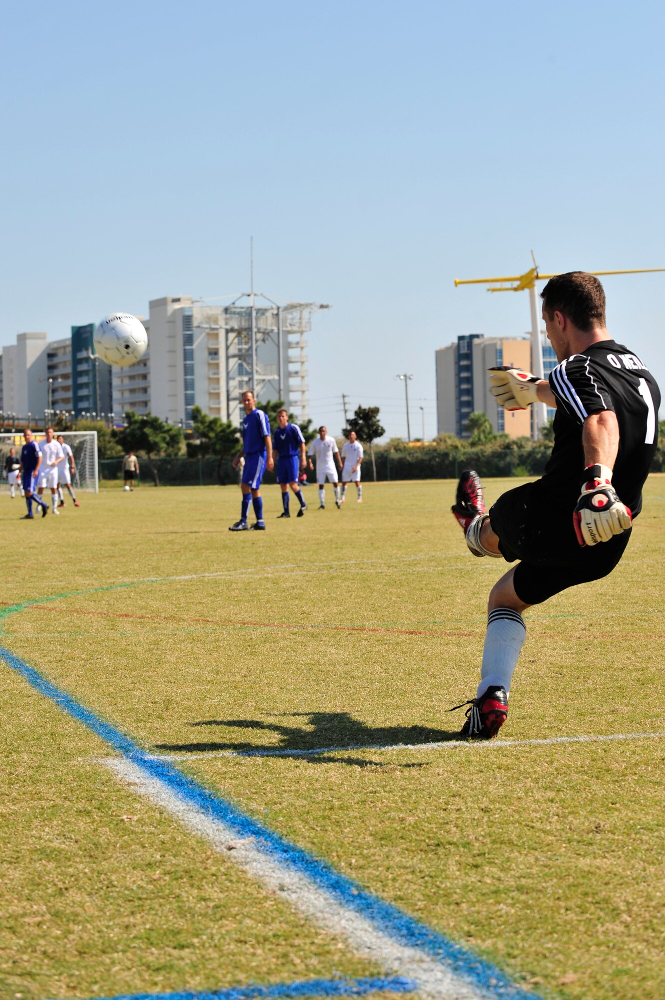U.S. Air Force Capt. Davide O'Neill, assigned to Eglin AFB, Fla., goalie for the USAF soccer team kicks the ball back into play during the during a 2010 Armed Forces Soccer Championship Round Robin match, Destin, Fla., Oct. 19, 2010. Each team conducted highly competitive training programs and trial camps in order to select the best players to represent their respective services.  However, at the conclusion of the tournament, inter-service rivals will cast aside their differences.  The top players from the tournament will be chosen to represent the US in the International Military Sports Competition. (DoD Photo by Staff Sgt. Stephanie Jacobs/RELEASED)
