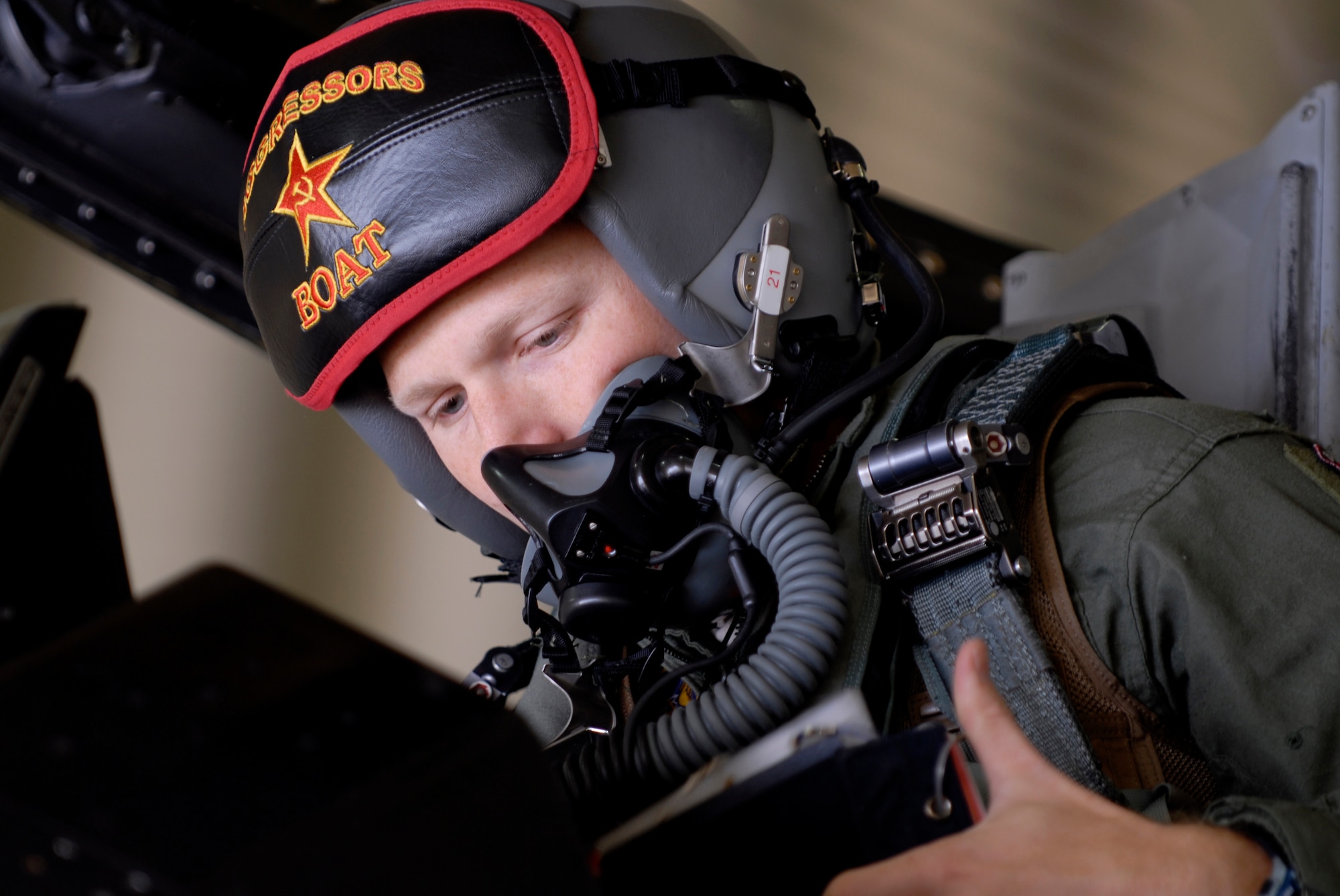 Capt. Jason Oates, 18th Agressor Squadron, prepares to fly his F-16 fighter at Osan Air Base, Republic of Korea, Oct. 18.  The 18th Agressor Squadron, deployed from Eielson Air Force Base, Alaska, will participate in the fourth annual MAX THUNDER exercise hosted by Kwanju Air Base, Republic of Korea.  The exercise will include side-by-side mission planning and practice of air operation scenarios. (U.S. Air Force Photo/Senior Airman Evelyn Chavez)