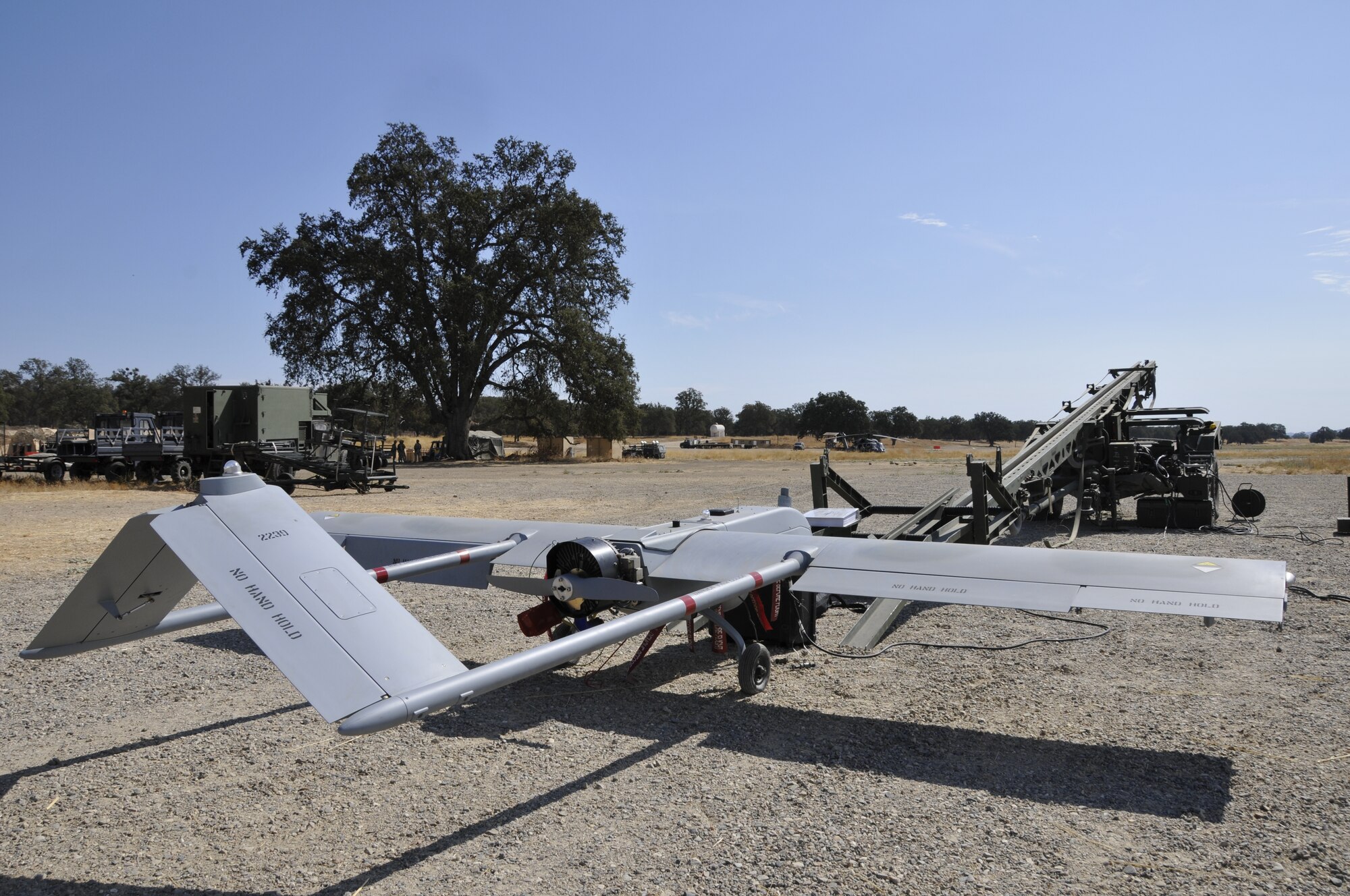 An unmanned aerial vehicle from the California Army National Guard sits before take-off during the 129th Rescue Wing's Soaring Angel exercise at Fort Hunter Liggett, Calif., Oct. 1, 2010. The tactical unmanned aerial system asset is being used to enhance situational awareness and terminal area survivability during personnel recovery scenarios. Soaring Angel is the 129th Rescue Wing's tactical training exercise that prepares Airmen for an upcoming Operational Readiness Inspection. (Air National Guard photo by Master Sgt. Dan Kacir)