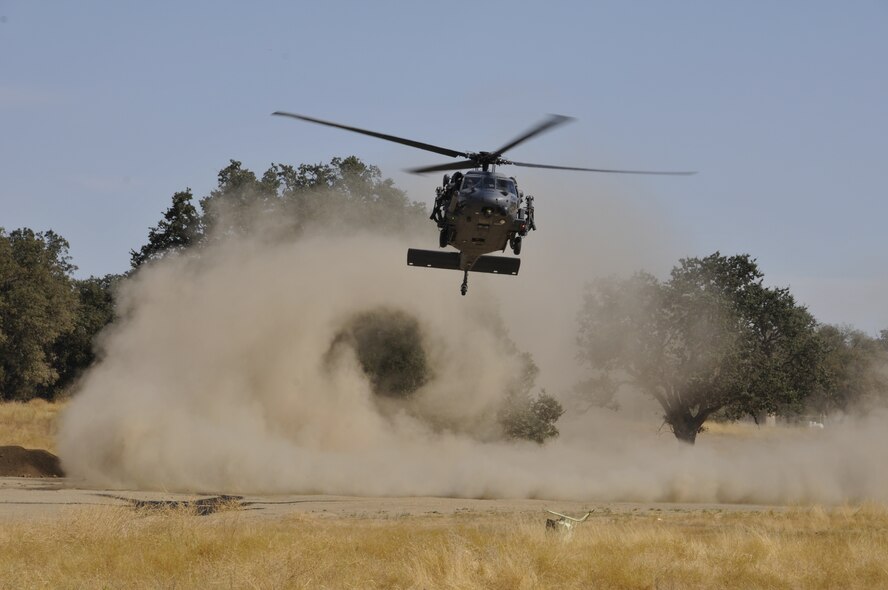 129th Rescue Squadron operators land an HH-60G Pave Hawk rescue helicopter after responding to a hostage recovery scenario during exercise Soaring Angel 10-2 Oct. 1, 2010 at Fort Hunter Liggett, Calif. Soaring Angel is the 129th Rescue Wing's tactical training exercise that prepares Airmen for an upcoming Operational Readiness Inspection. (Air National Guard photo by Master Sgt. Dan Kacir)