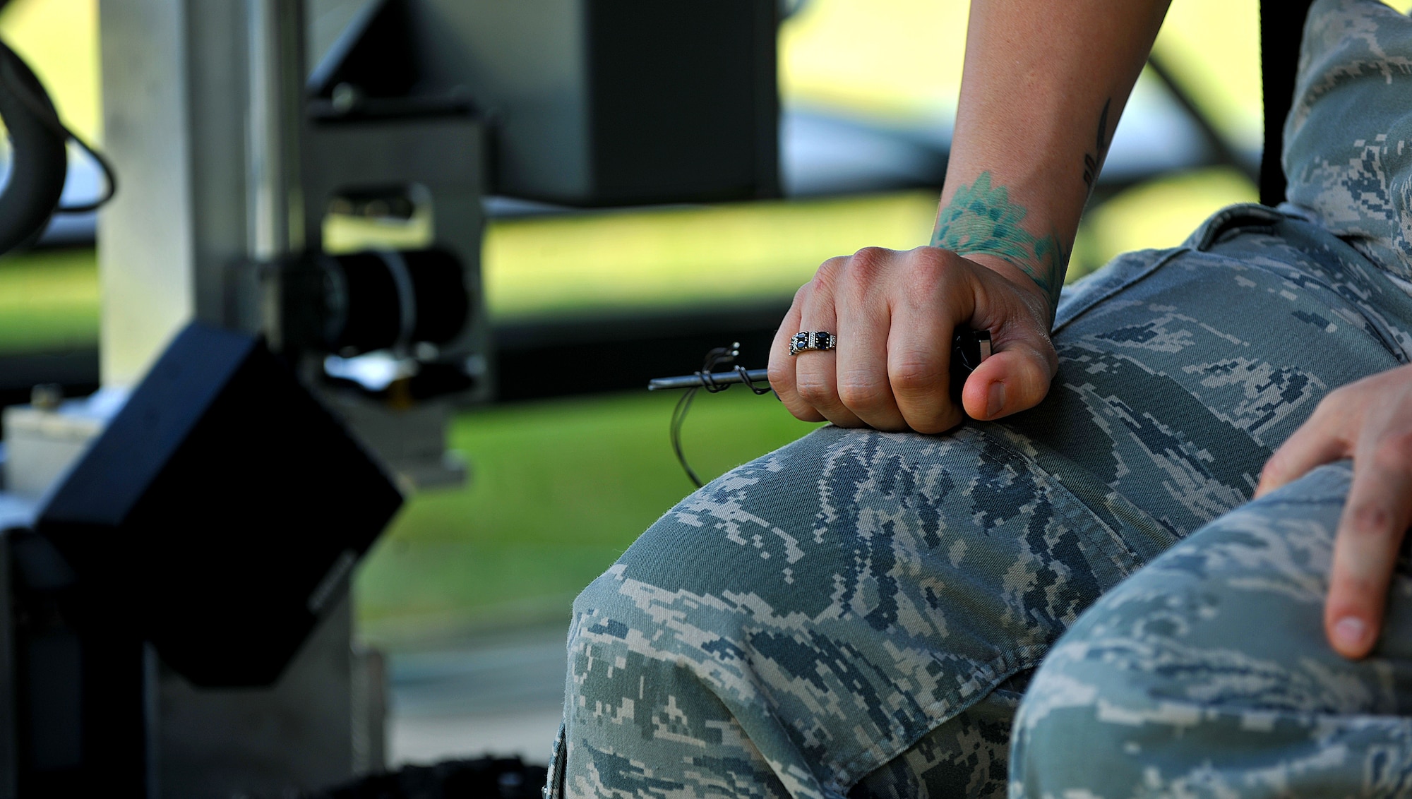 Staff Sgt. Rhianna Hall holds on to a detonation trigger during a hostage training exercise Oct. 13, 2010, at Moody Air Force Base, Ga. Sergeant Hall is the combat arms training and maintenance range instructor assigned to the 23rd Security Forces Squadron. (U.S. Air Force photo/Airman 1st Class Joshua Green) 