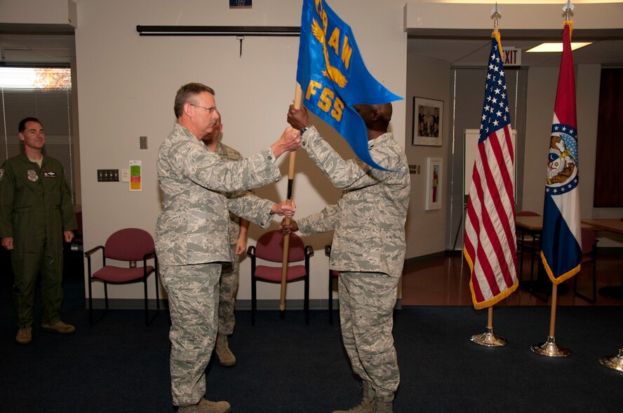 Lt. Col Seymore Mitchell (right) assumes command of the Force Support Squadron, Sunday, October 17, 2010 at the 139th Airlift Wing, St. Joseph, Mo.  (U.S. Air Force photo by Airman 1st Class Kelsey Stuart/Released)