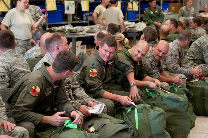 Members of the 139th Airlift Wing, Missouri Air National Guard, prepare for a deployment on October 16, 2010 at Rosecrans Memorial Airport Saint Joseph MO. (U.S. Air Force photo by Senior Airman Sheldon Thompson/Released)