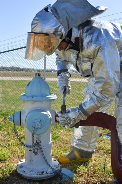 Firefighters of the 139th Airlift Wing, Missouri Air National Guard, participate in their Semi-Annual Munitions Area Response exercise Saturday, October 16, 2010 at Rosecrans Memorial Airport, St. Joseph, Mo.  This particular exercise covers explosives, munition classifications, firefighting tactics, overall safety and hazard procedures that they could possibly face.  (U.S. Air Force photo by Airman 1st Class Kelsey Stuart/Released)