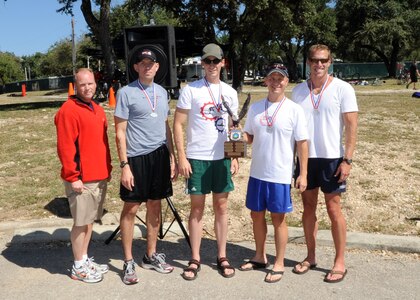 Capt Jeff Anderson, Lt Sean Bourdon, Lt Col Corwin Pauly, and Lt Col Chris Wyckoff, members of the "Flesh Peddlers" Xtreme Team  receive a trophy at the Rambler 120 held at Canyon Lake. 
(U.S. Air Force photo/Melissa Peterson)