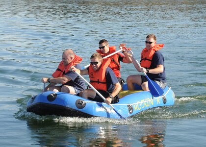 Lt Col David Drichta, Greg Ulrich, Capt Jason Bianchi, and Capt Cale Marthens compete during the Rambler 120 held at Canyon Lake. (U.S. Air Force photo/Melissa Peterson)