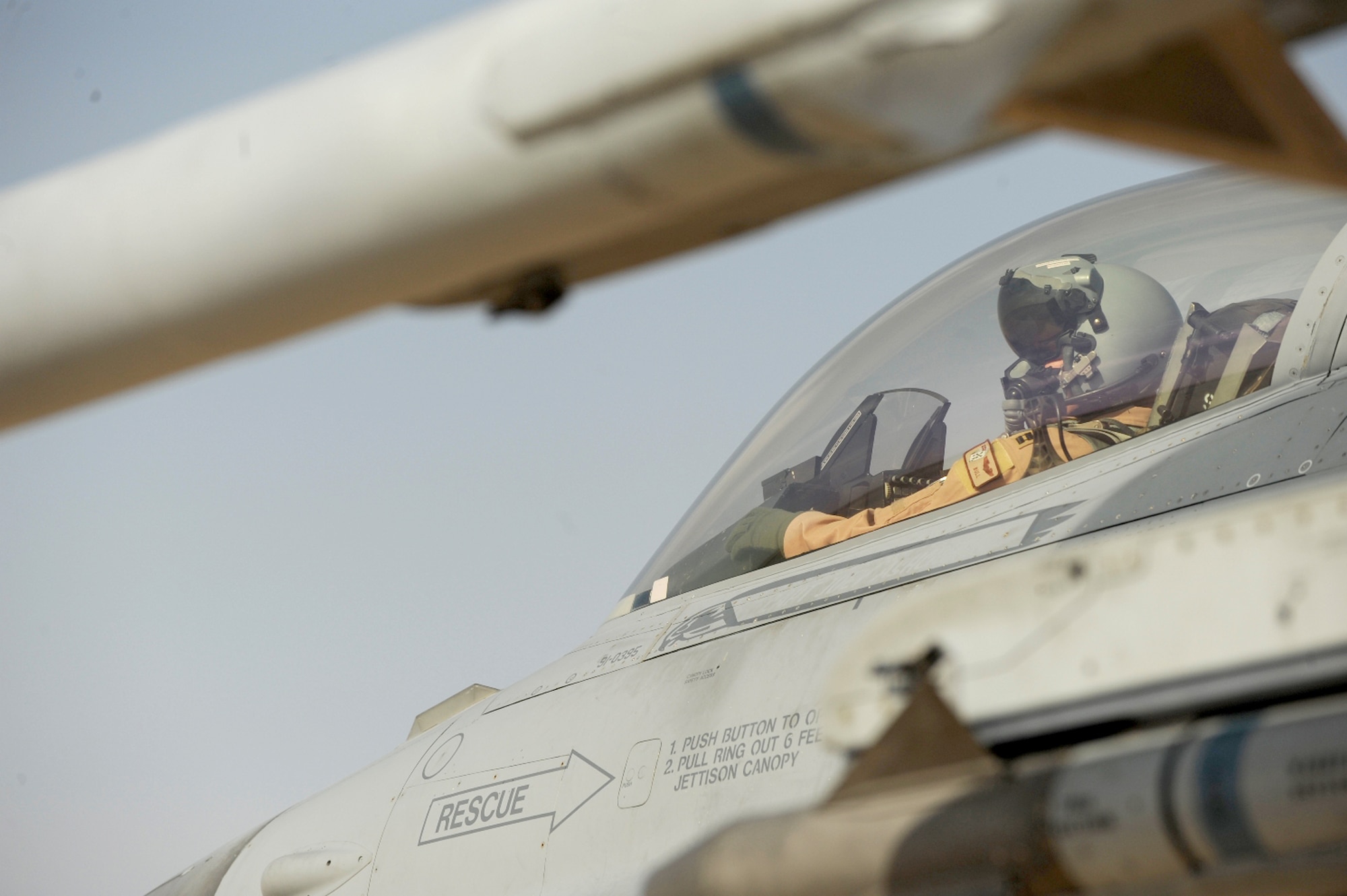 Capt. Bailyn Beck prepares an F-16 Fighting Falcon for takeoff Oct. 18, 2010, as part Falcon Air Meet 2010 at Azraq Air Base, Jordan. Captain Beck is assigned to the 77th Fighter Squadron from Shaw Air Force Base, S.C. (U.S. Air Force photo/Staff Sgt. Eric Harris)