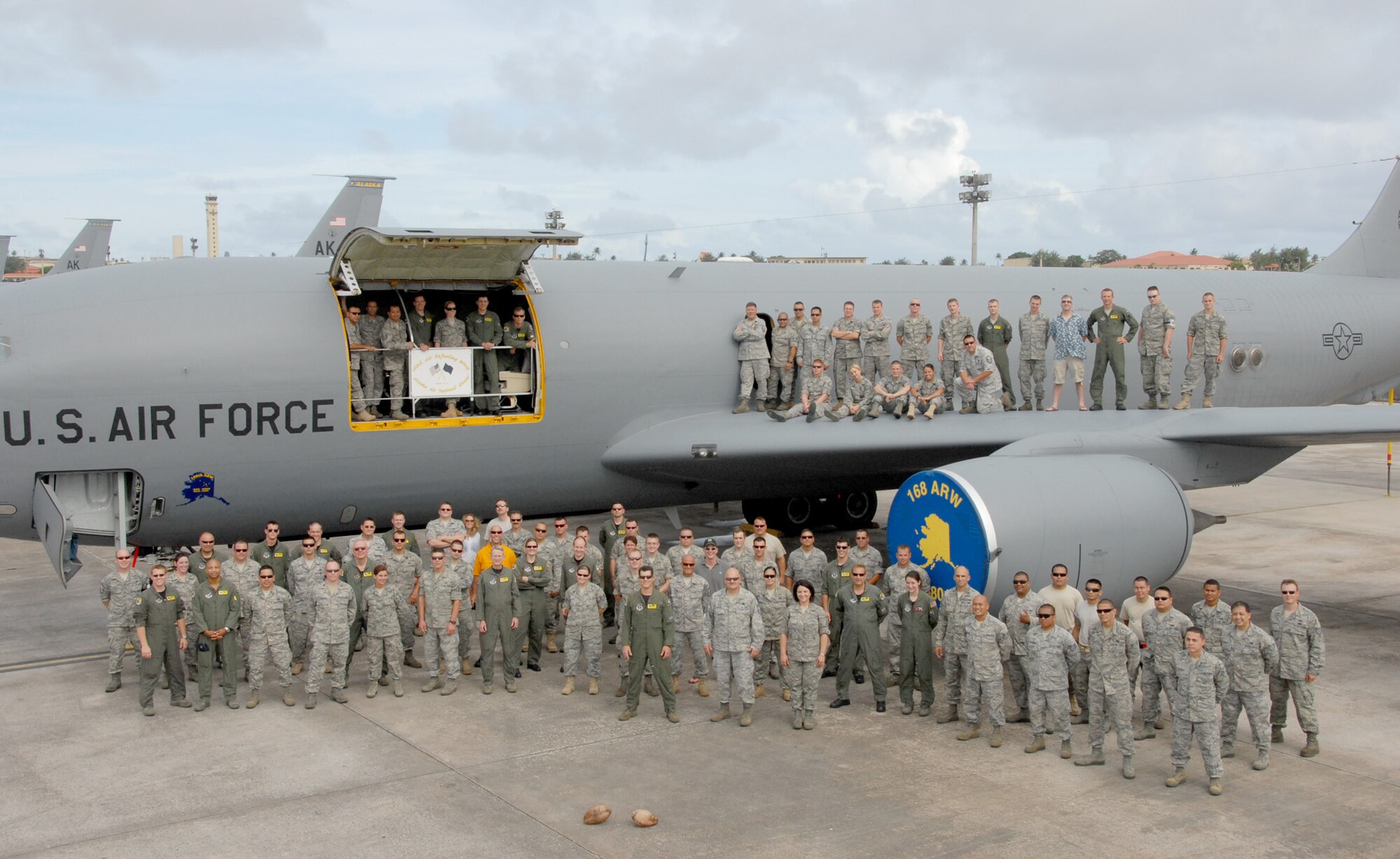 Members of the 506th Expeditionary Air Refueling Squadron pose with Guam Air National Guard members for a unit photo Oct. 1, 2010, on the flightline at Andersen Air Force Base, Guam. Both units are working in support of the continuous bomber presence and theatre security package and will remain here until Oct. 31. (U.S. Air Force courtesy photo)
