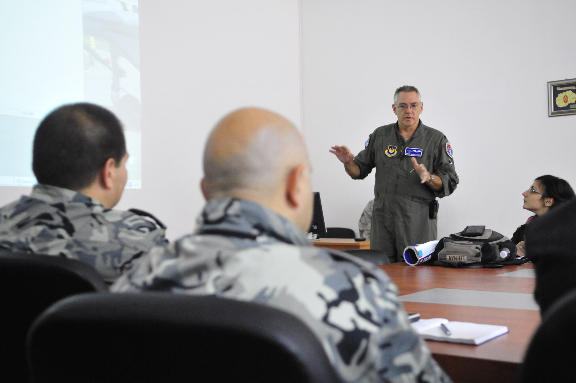 Lt. Col. Robert Lehman, 86th Medical Squadron flight surgeon, briefs medical professionals from the Bulgarian Air Force during a round-table discussion on the history and future of flight medicine, Oct. 19 at Graf Ignatievo Air Base, Bulgaria. Airmen from the 86th Airlift Wing and 435th Air Ground Operations Wing at Ramstein Air Base, Germany joined airmen from throughout U.S. Air Forces in Europe in Plovdiv, Bulgaria, for Thracian Fall 2010, a week of on-site training designed to building the partnership between the U.S. and Bulgarian Air Force. (U.S. Air Force photo by Tech. Sgt. Michael Voss)