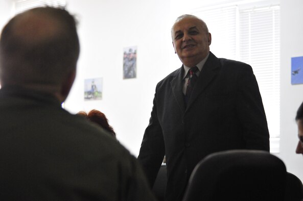 Bulgarian doctor Teodosii Valchev Androvski ask U.S. Air Force Maj. Ryan Freeland, 480th Fighter Squadron flight surgeon from Spangdahlem Air Base, Germany, a question about how the U.S. Air Force handles combat medical care during a round-table discussion at Graf Ignatievo Air Base, Bulgaria, Oct. 19. Airmen from the 86th Airlift Wing and 435th Air Ground Operations Wing at Ramstein Air Base, Germany, joined Airmen from throughout U.S. Air Forces in Europe in Plovdiv, Bulgaria, for Thracian Fall 2010, an on-site training designed to build the partnership between the U.S. and Bulgarian Air Force. (U.S. Air Force photo by Tech. Sgt. Michael Voss) 

