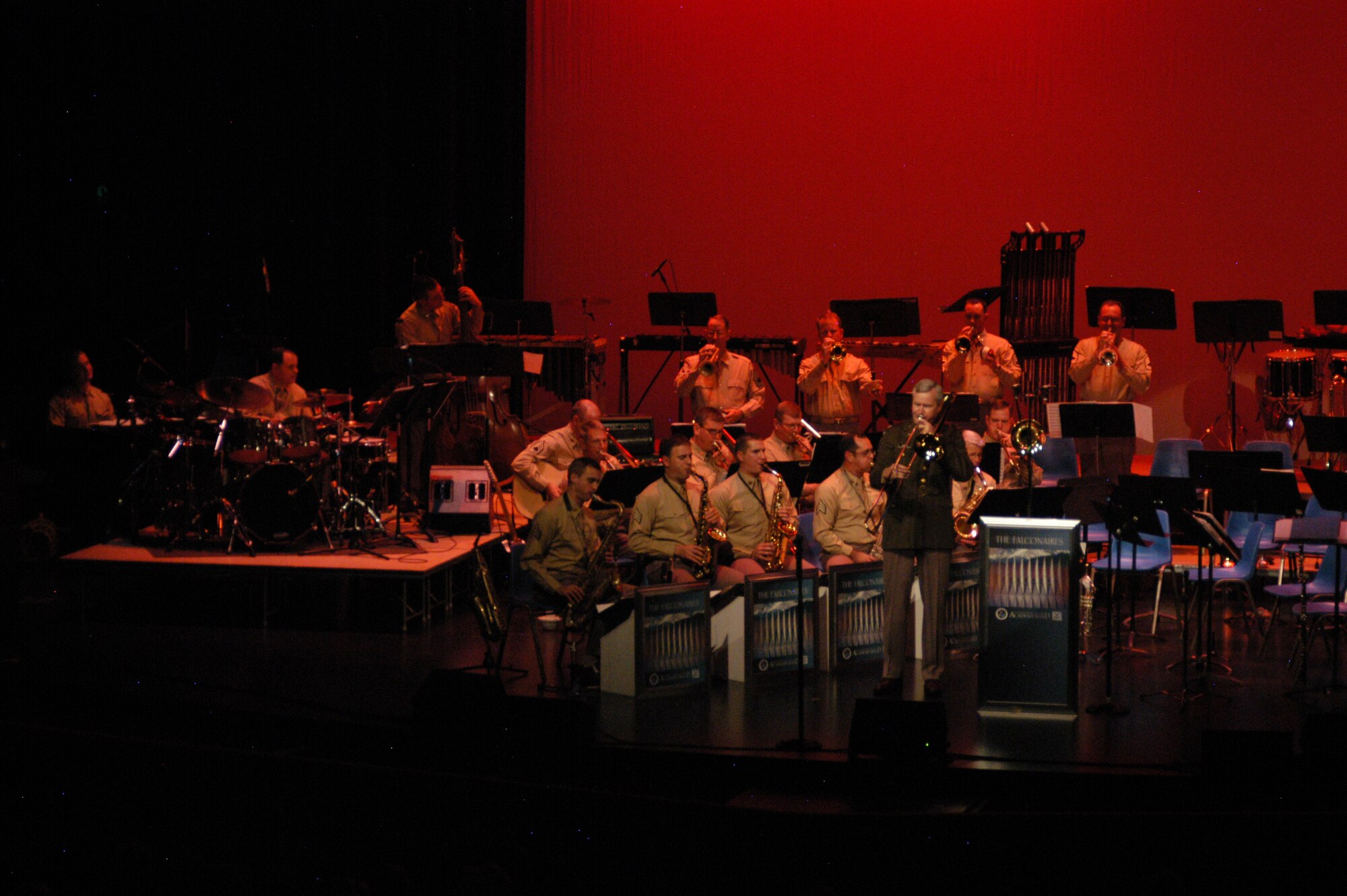 Starring in the a convincing rendition of Major Glenn Miller of the US Army Air Corps is Lieutenant Colonel Larry H. Lang, who is an accomplished instrumentalist in addition to his job as Commander and Conductor of the USAF Academy Band.
