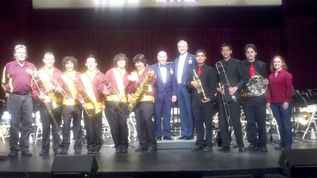 The band’s Educational Outreach program under the direction of Technical Sergeant Nancy Poffenbarger features young high school music students performing with the band. Selected to play  with the band on Bill Barbier’s “Air Force Musicians Association March” were Juan Gallegos on trumpet, Benjamin Iniguez on horn and Reyver Fontes on trombone from the Rio Rico High School Band under the direction of Allison Coyle. From the Nogales High School Band under the direction of James Cochran were student performers Manuel Armenta-Batt on baritone saxophone, German Larios on trumpet and Alan Ramirez, Nicholas Clark and Tim Medina all on trombone.  