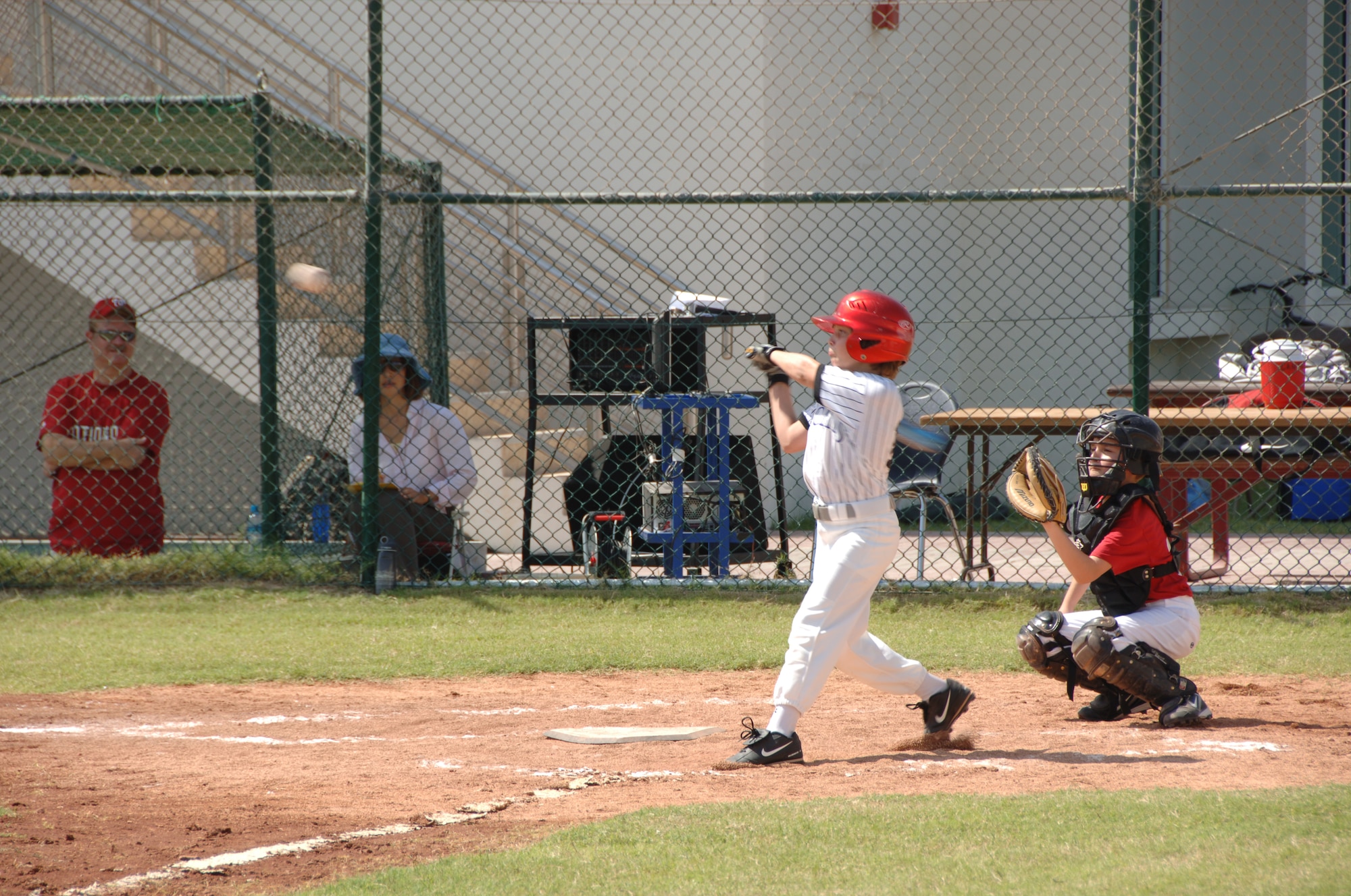 SOUTHWEST ASIA - The Nationals play their first game of the season here Oct. 15. Kids from more than 20 different nationalities play American baseball at our host nation's American High School. (U.S. Air Force photo/Tech. Sgt. Kimberly Spinner)