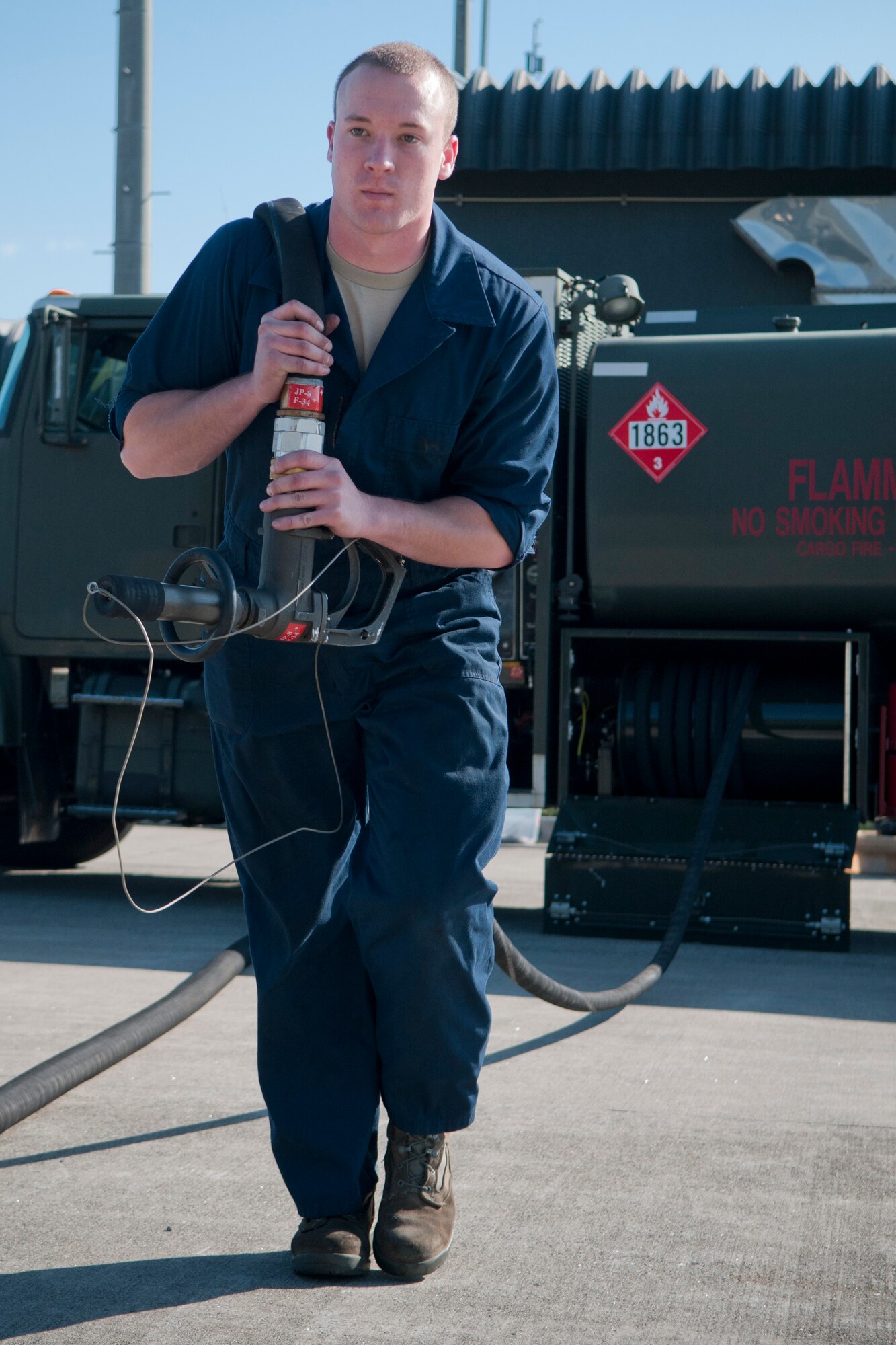 Airman 1st Class Mark Roth, 35th Logistic Readiness Squadron fuels specialist, drags a hose from a fuel truck while performing a fuel truck inspection at Misawa Air Base, Japan, Oct. 19, 2010, during a Logistics Compliance Assessment Program inspection. Misawa’s LCAP inspection, conducted every two years, will evaluate the logistic functions of the 35th LRS and 35th Maintenance Group. (U.S. Air Force photo by Senior Airman Jessica Lockoski/Released)