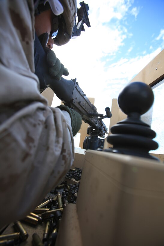 Student riders watch a demonstration of a motorcycle turning drill Oct. 21, 2010, at the Combat Center’s motorcycle range. The students received classes and knowledge along with practical application time from instructors with Total Control, an advanced riding clinic that visited the Combat Center Oct. 18 – 22.