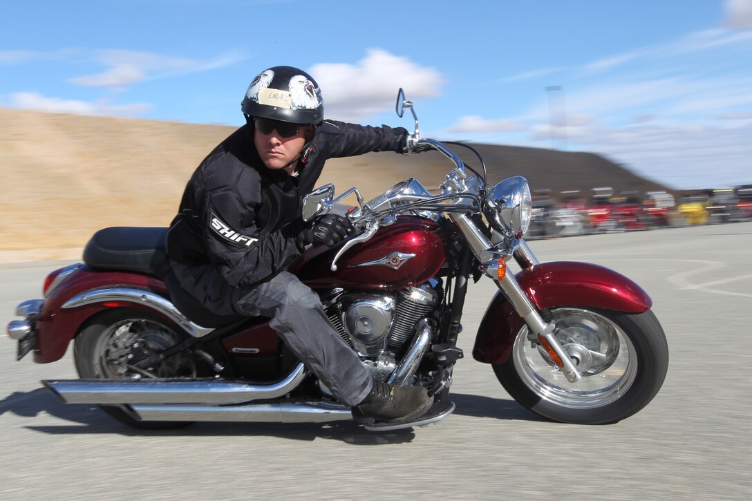 Sergeant Endri Kennon, a student rider with Total Control advanced riding clinic, turns his head during an exercise Oct. 21, 2010 at the Combat Center’s motorcycle range. Kennon is in Weapons Company 2nd Battalion, 7th Marine Regiment.