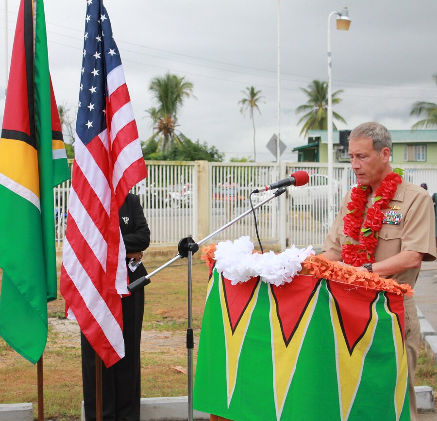 Navy Capt. Thomas M. Negus, commodore of Continuing Promise 2010, speaks during the CP10 opening ceremony, Oct. 20, 2010, at the Berbice Regional Health Authority.