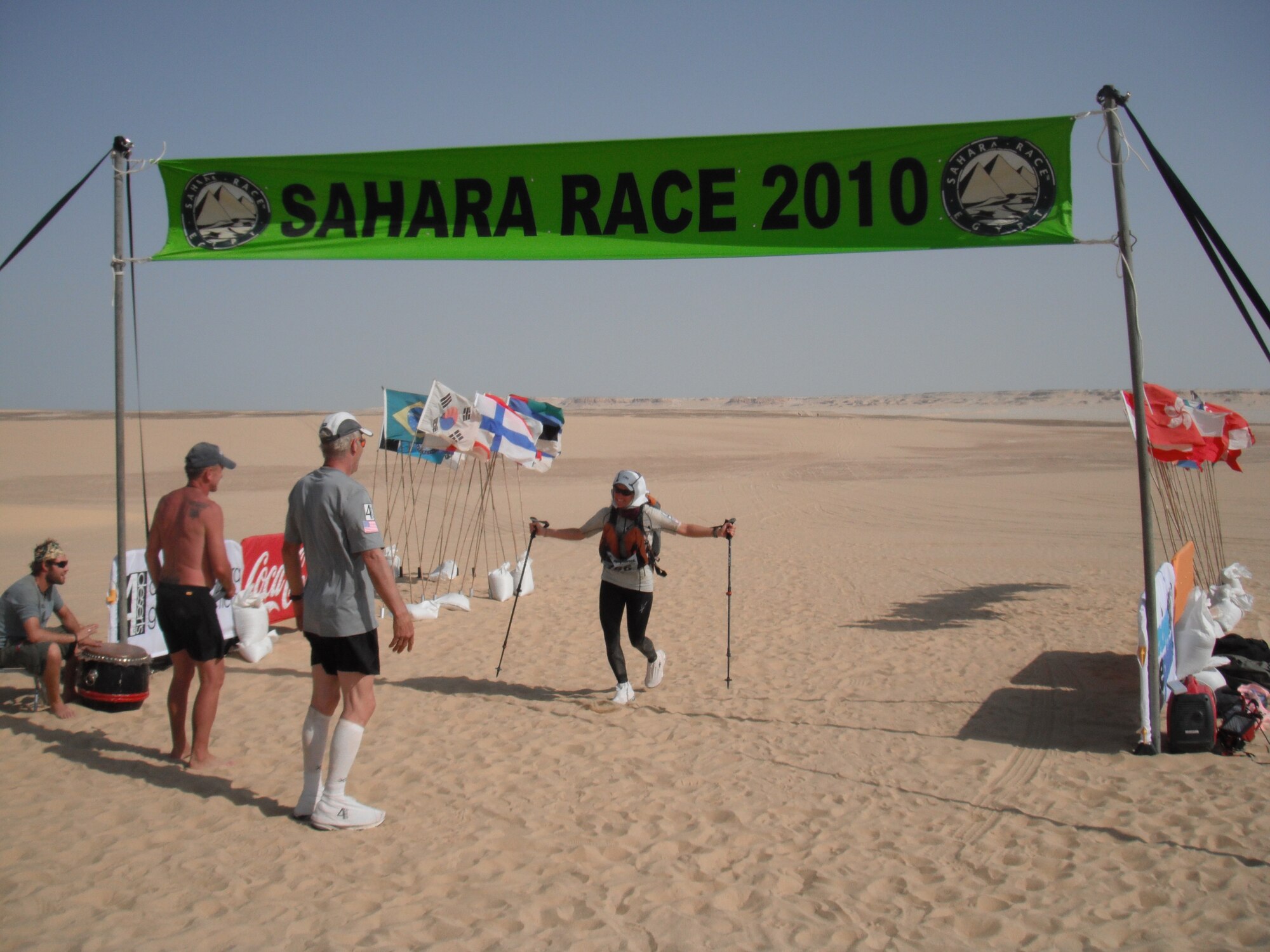 SAHARA DESERT, Egypt - Crossing the finish line, Capt. Carrie Zederkof, a 533rd Training Squadron space-based infrared system mission instructor, completed the 155-mile Sahara Race at the Great Pyramids of Giza, Egypt, on Saturday, Oct. 9, 2010. Captain Zederkof was the seventh female and the 39th person out of 156 people to cross the finish line. (Courtesy photo)