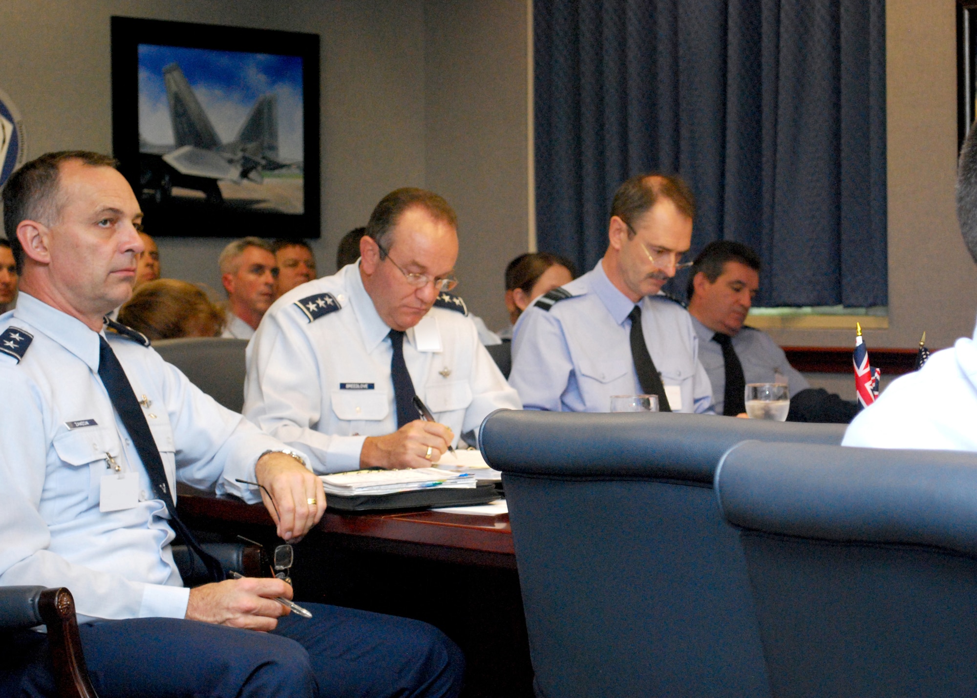 Lt. Gen. Philip Breedlove and Air Marshal Richard Garwood came together in the Pentagon's Warfighter Capability Demonstration Center to discuss their continued encouragement of coalition play in synthetic training and distributed mission operations.  Their discussion centered on live feeds from the training exercise Coalition Virtual Flag 10-4 at Kirtland AFB. General Breedlove is the Air Force Deputy Chief of Staff for Operations, Plans and Requirements and Air Marshal Garwood is the Royal Air Force Deputy Commander-in-Chief Operations. (U.S. Air Force photo)