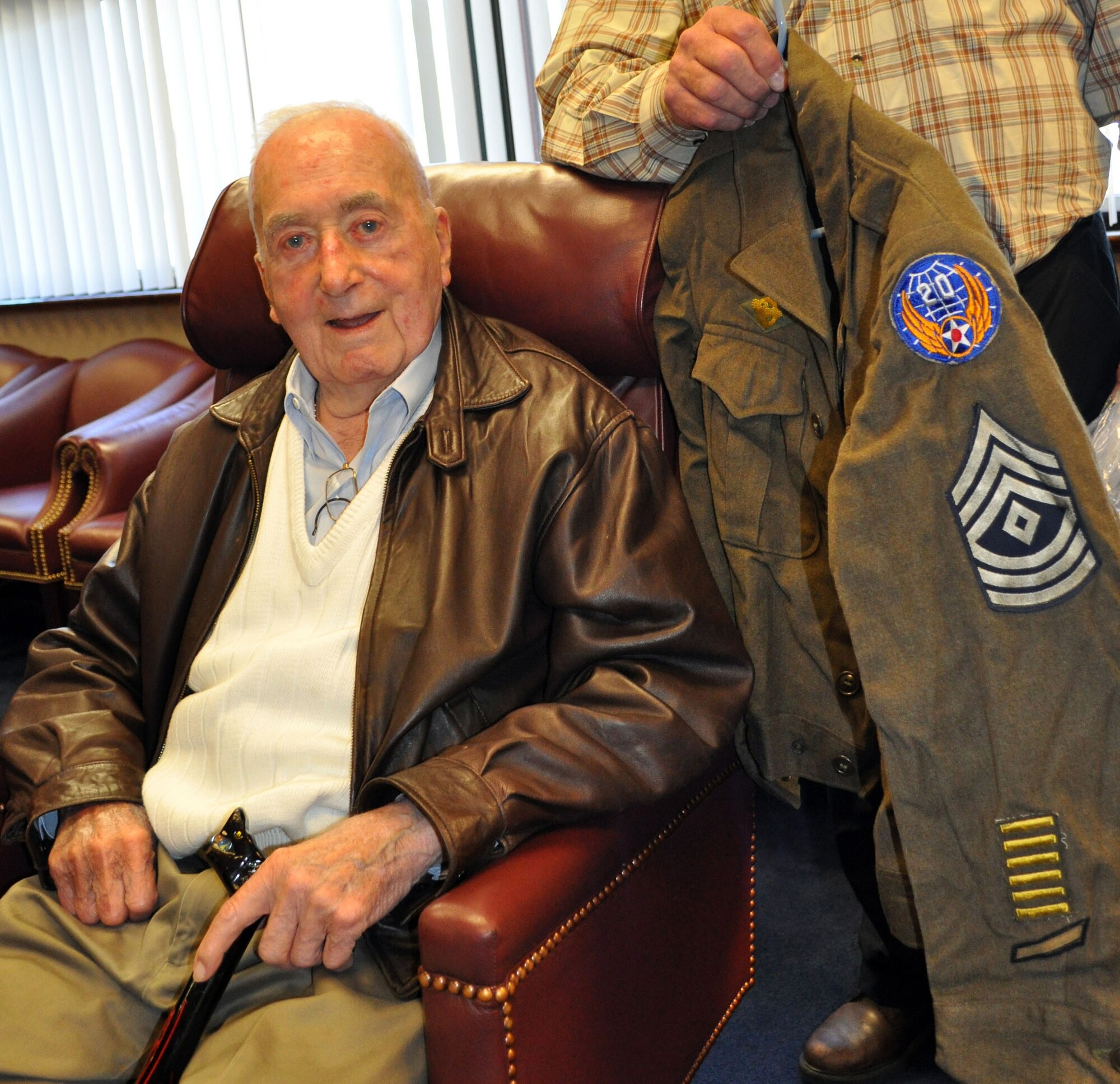 TRAVIS AIR FORCE BASE, Calif. -- Master Sgt. (U.S. Army Air Corps, ret.) Bill Meck, donates his World War II uniform he wore, and recently. (U.S. Air Force photo/Senior Master Sgt. Ellen L. Hatfield)