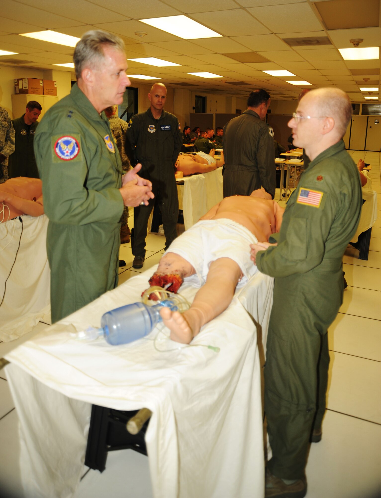 Lead Instructor and program coordinator, Maj. Chad Corliss, demonstates the capabilities of the new state of art patient care facility at the 440th  Formal Training Unit to Maj. Gen. Brian Meenan during a recent visit to the training facility at Pope Field, N.C. (U.S. Air Force photo by Jerry Green)
