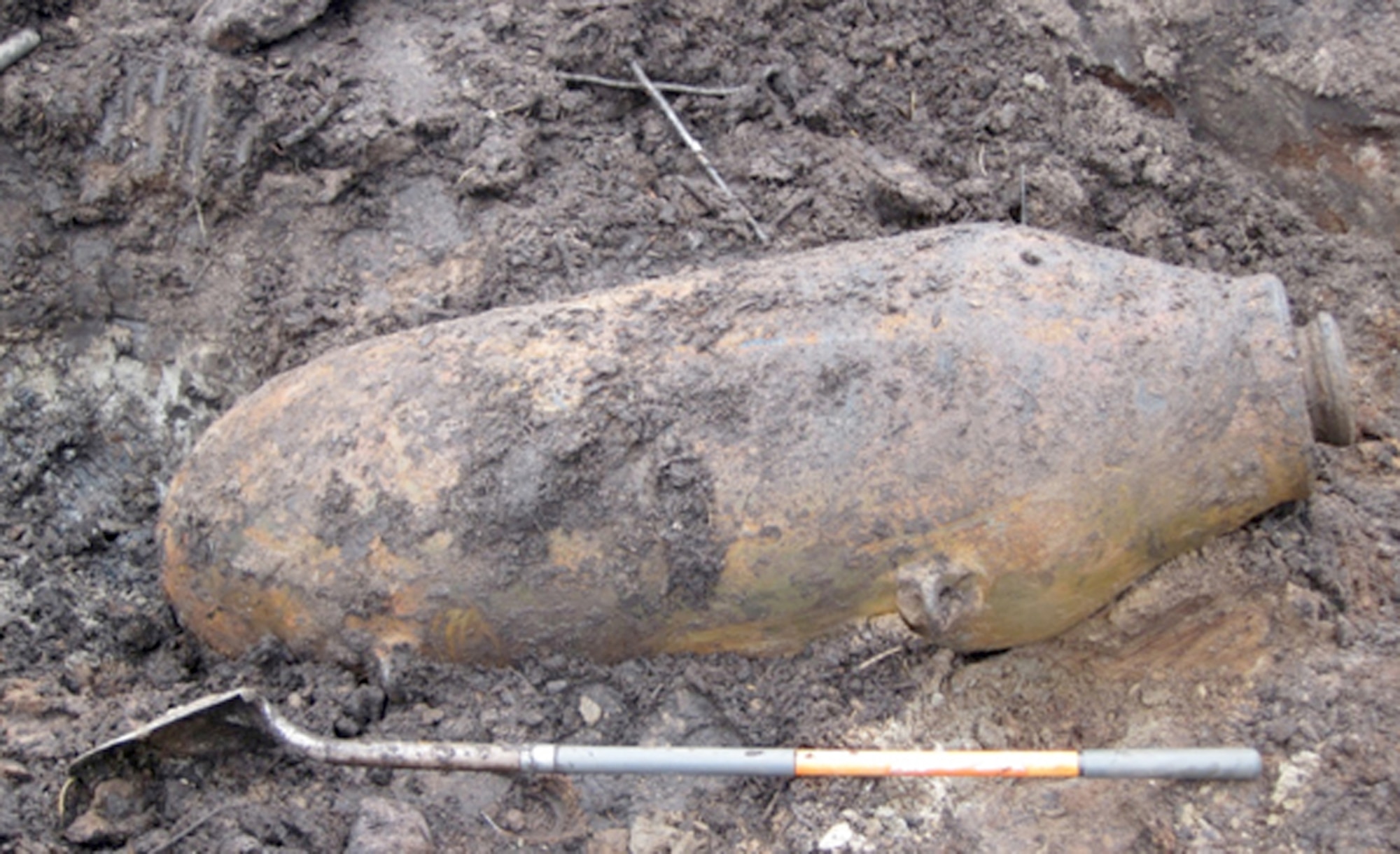 A 2,000-pound general purpose bomb was recently discovered in the drained portion of Joe English Pond at New Boston Air Force Station, N.H. The bomb was intentionally detonated on site, under the oversight of Army Corps of Engineer safety representatives. (Courtesy photo)