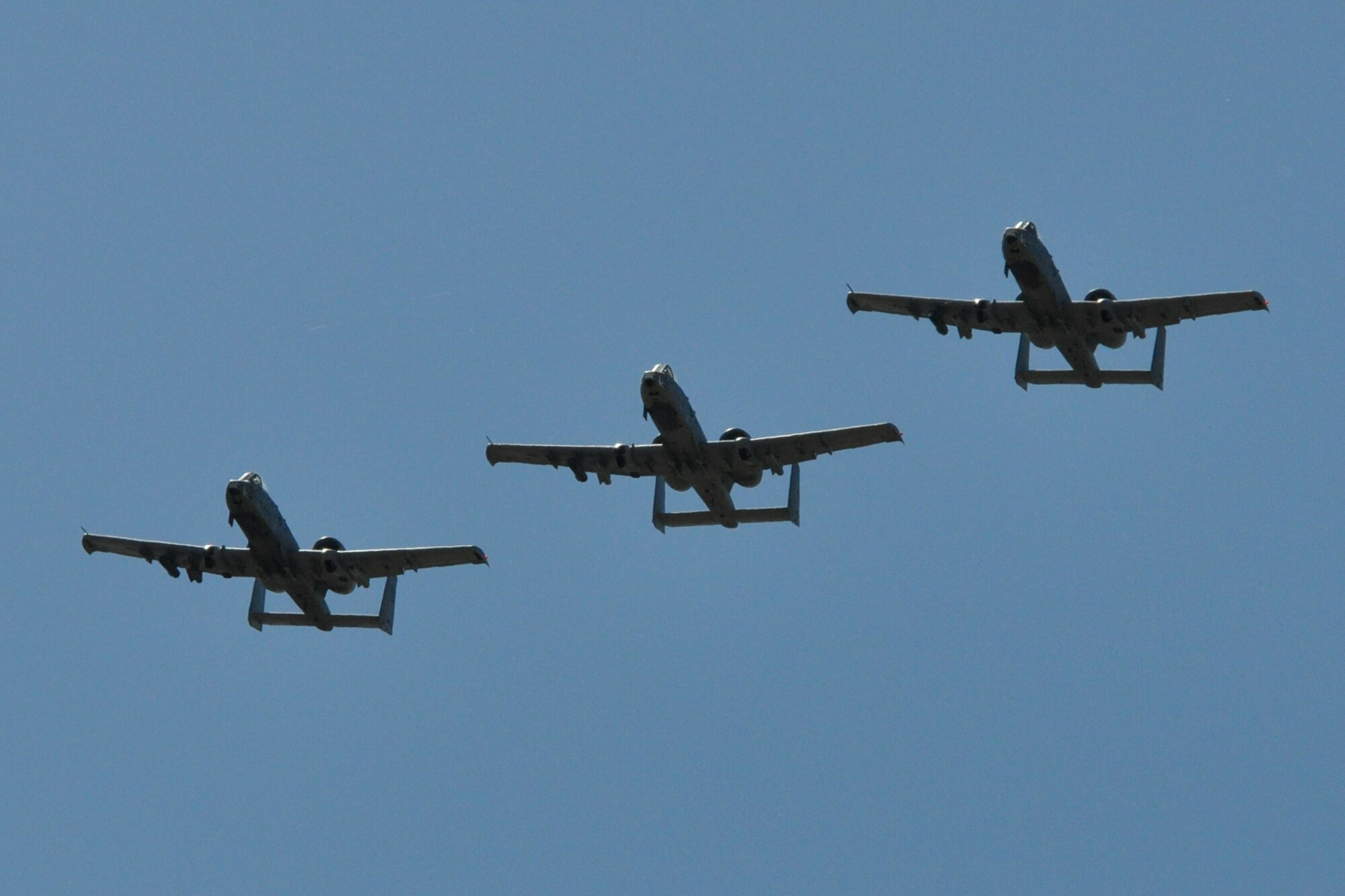 A three-ship formation from the 47th Fighter Squadron leaves the Saylor Creek Range in Idaho after competing in Hawgsmoke 2010, Oct. 14, 2010. Due to a malfunction in one of the 47th FS jets, only three pilots were able to compete. Members of the 917th Wing and 47th Fighter Squadron at Barksdale Air Force Base, La., were in Boise supporting and competing in Hawgsmoke 2010, which is a biennial worldwide A-10 bombing, missile and tactical gunnery competition. The competition, which is a biennial worldwide A-10 bombing, missile and tactical gunnery competition, this year involved 40 jets and 72 pilots from 18 different units, and was hosted by the 190th Fighter Squadron of the 124th Fighter Wing, Idaho Air National Guard. (U.S. Air Force photo/Tech. Sgt. Jeff Walston)