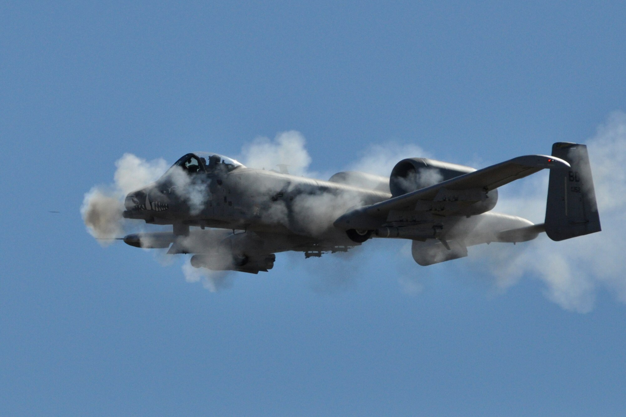 Capt. Jason Cobb, an A-10 pilot assigned to the 47th Fighter Squadron of the 917th Wing at Barksdale Air Force Base, La., fires a volley of 30 millimeter rounds at a target on the Saylor Creek Range in Idaho, Oct. 14, 2010, during Hawgsmoke 2010. The competition, which is a biennial worldwide A-10 bombing, missile and tactical gunnery competition, this year involved 40 jets and 72 pilots from 18 different units, and was hosted by the 190th Fighter Squadron of the 124th Fighter Wing, Idaho Air National Guard. Captain Cobb, who hails from Idaho and transitioned to the 47th FS from 190th FS felt right at home during the competition. He took home two personal awards from Hawgsmoke 2010. (U.S. Air Force photo/Tech. Sgt. Jeff Walston)