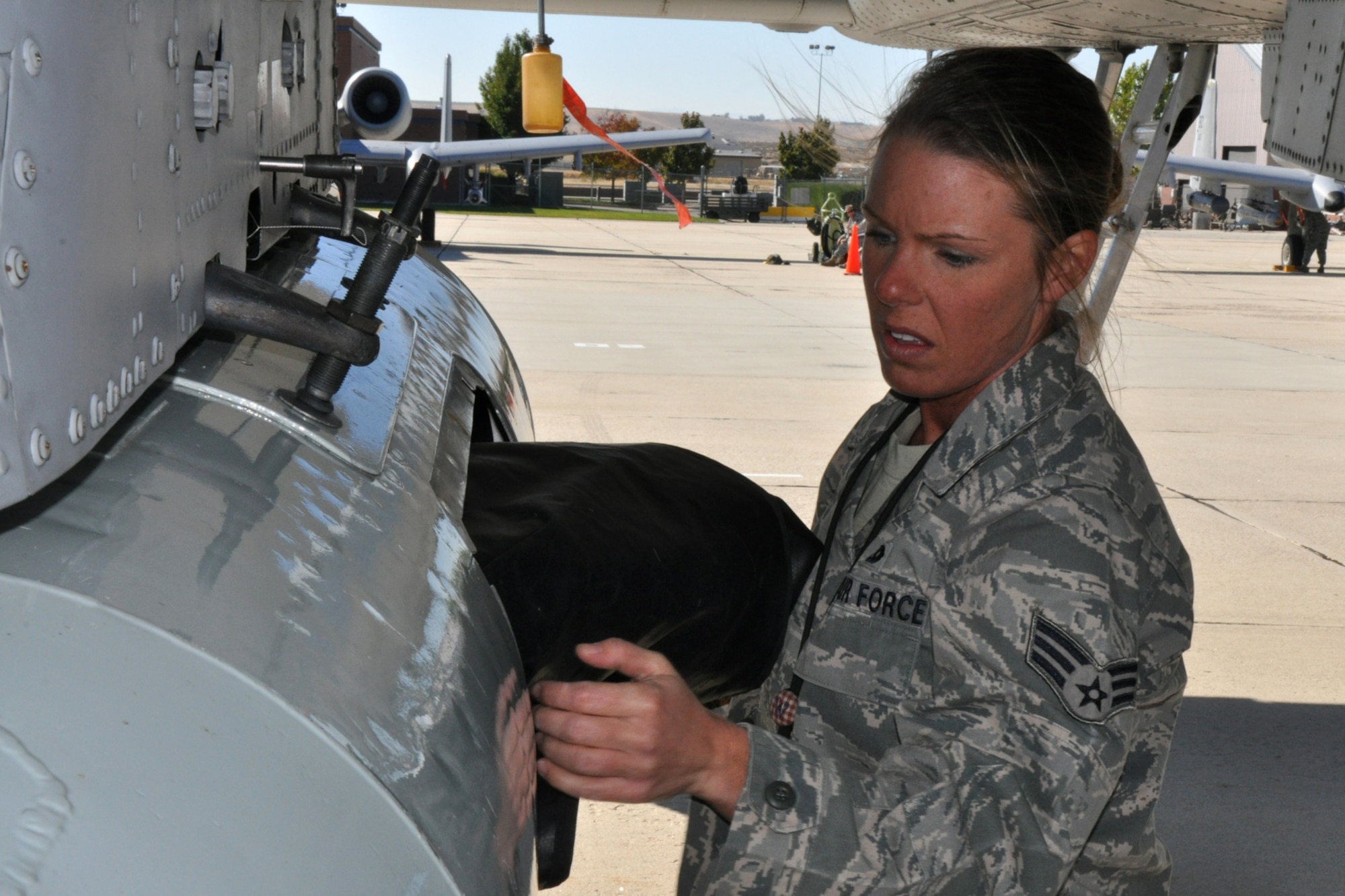 Senior Airman Rikki Welch, 917th Aircraft Maintenance, phase dock, stores engine covers for an A-10 Thunderbolt II during Hawgsmoke 2010 in Boise, Idaho, Oct. 13, 2010. Members of the 917th Wing and 47th Fighter Squadron at Barksdale Air Force Base, La., are in Boise supporting and competing  Hawgsmoke 2010, which is a biennial worldwide A-10 bombing, missile and tactical gunnery competition. (U.S. Air Force photo/Tech. Sgt. Jeff Walston) 