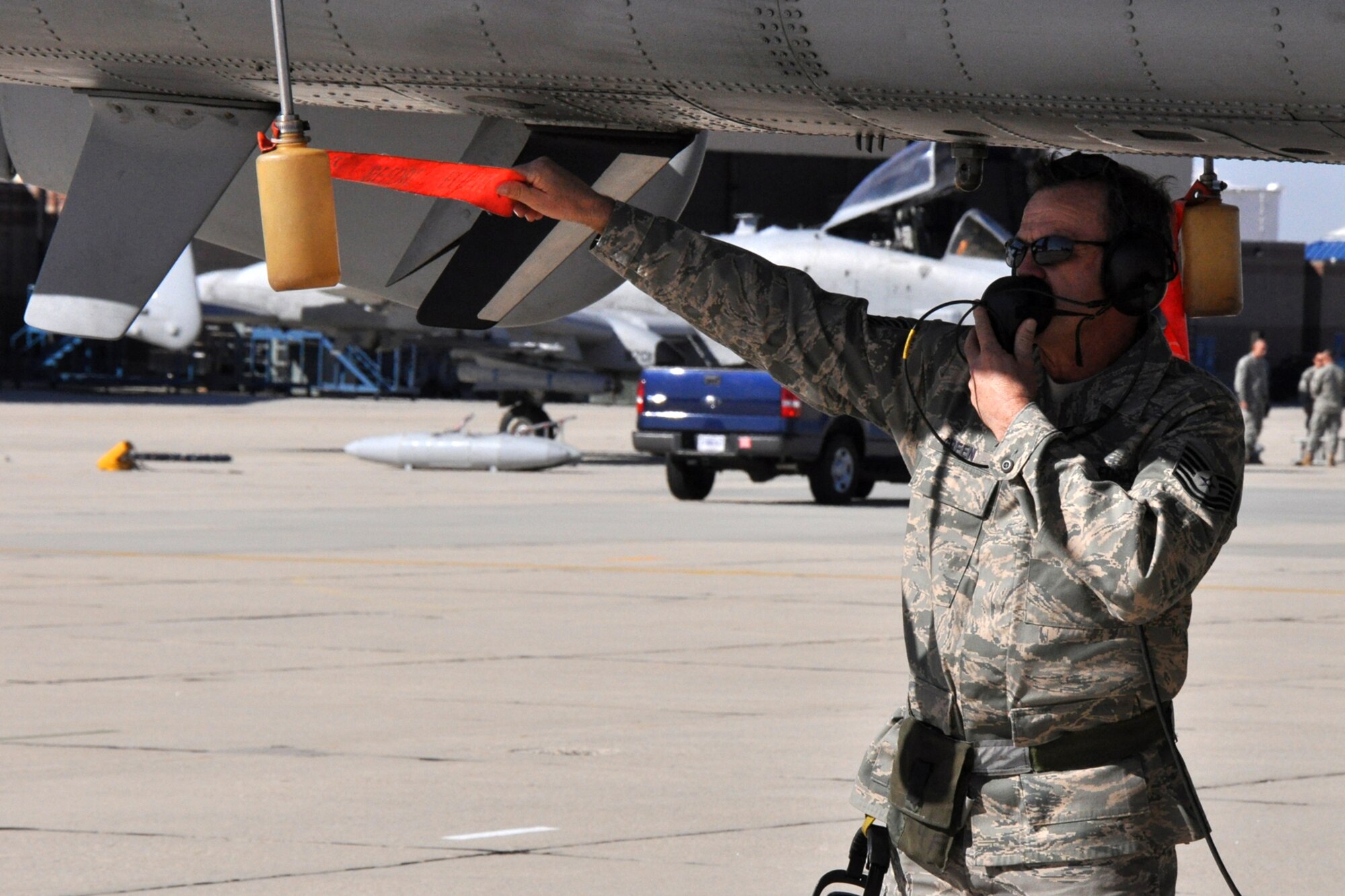 Technical Sgt. Kenneth Green, an A-10 aircraft mechanic with the 717th Aircraft Maintenance Squadron at Barksdale Air Force Base, La., checks the engine fuel overflow of an A-10 Thunderbolt II on the ramp of Gowen Field in Boise, Idaho, Oct. 13, 2010. Members of the 917th Wing and 47th Fighter Squadron at Barksdale Air Force Base, La., were in Boise supporting and competing in Hawgsmoke 2010, which is a biennial worldwide A-10 bombing, missile and tactical gunnery competition. The competition this year, which involved 40 jets and 72 pilots from 18 different units, was hosted by the 190th Fighter Squadron of the 124th FW. (U.S. Air Force photo/Tech. Sgt. Jeff Walston) 