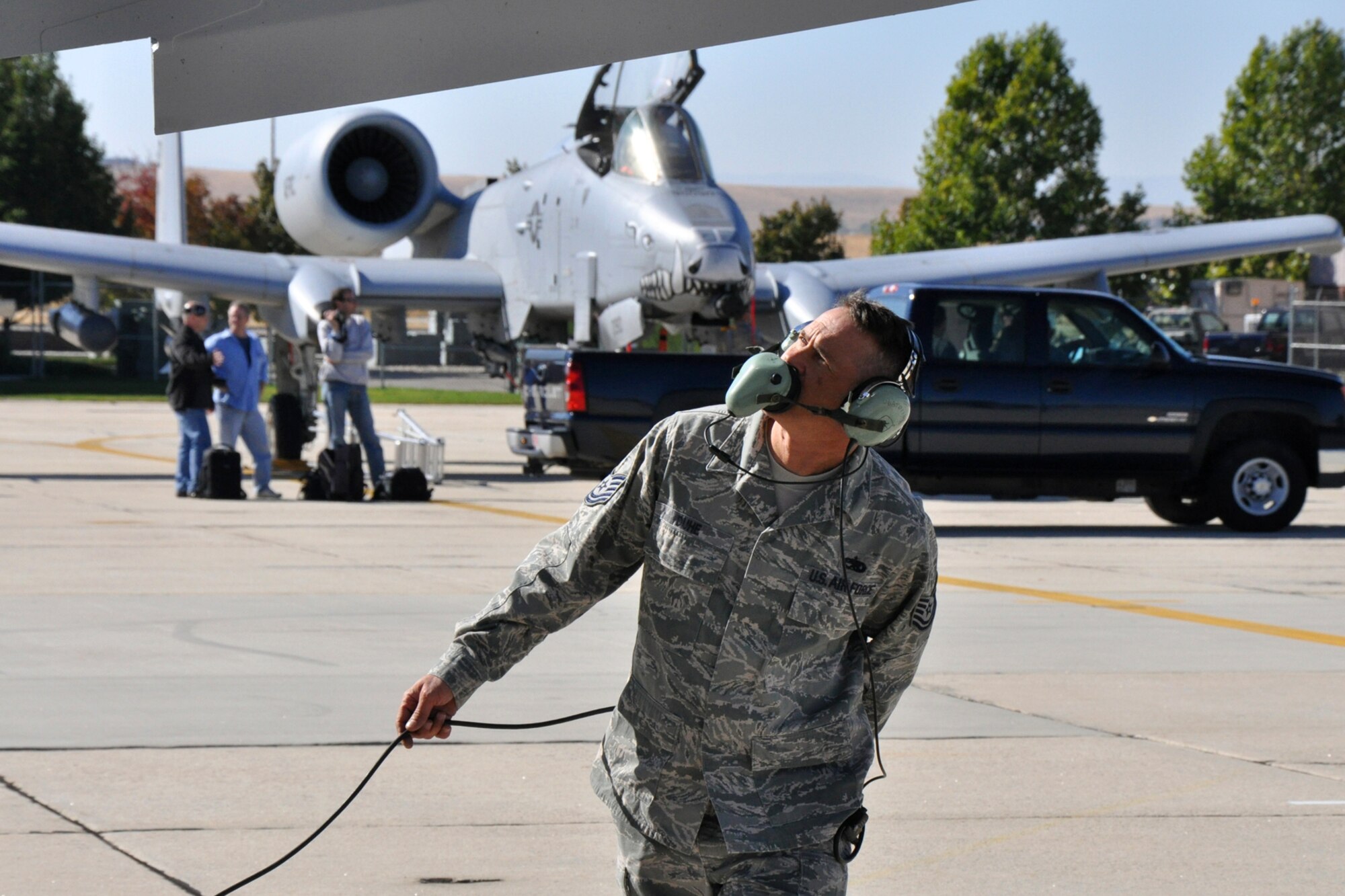 Technical Sgt. Chris Duhe, a crew chief with the 717th Aircraft Maintenance Squadron, performs a post-flight inspection of an A-10 Thunderbolt II on the ramp of Gowen Field in Boise, Idaho, Oct. 13, 2010. Sergeant Duhe is one of seven support personnel  from the 917th Wing at Barksdale Air Force Base, La., who were in Boise supporting Hawgsmoke 2010, which is a biennial worldwide A-10 bombing, missile and tactical gunnery competition. (U.S. Air Force photo/Tech. Sgt. Jeff Walston) 