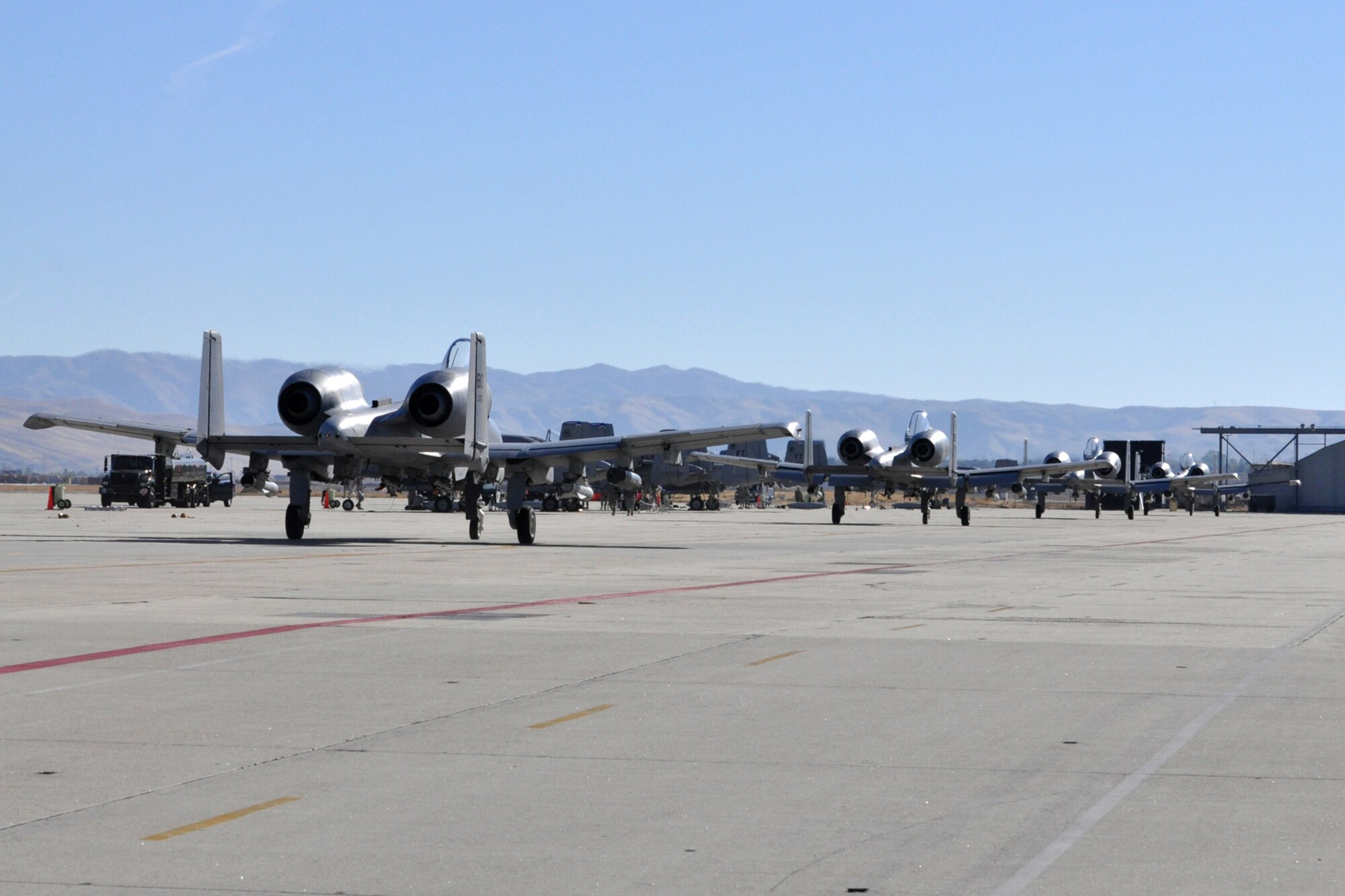 A-10 Thunderbolt II jets from the 47th Fighter Squadron from Barksdale Air Force Base, La., taxi to the runway for an orientation flight before competing in Hawgsmoke 2010 in Boise, Idaho, Oct. 13, 2010. Members of the 917th Wing and 47th Fighter Squadron from Barksdale AFB, were in Boise supporting and competing  Hawgsmoke 2010, which is a biennial worldwide A-10 bombing, missile and tactical gunnery competition. (U.S. Air Force photo/Tech. Sgt. Jeff Walston) 