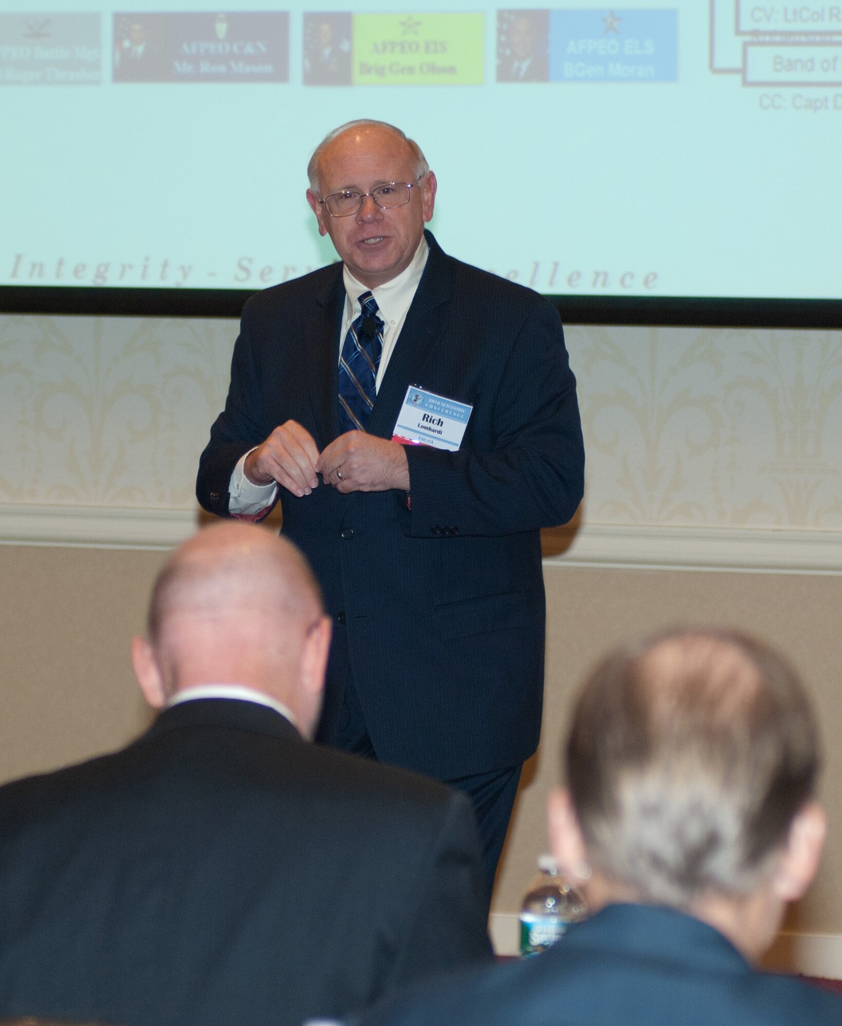 The Air Force announced that Electronic Systems Center Executive Director Rich Lombardi, seen here speaking at the Net-centric Operations Conference in New Hampshire last month, is among the list of Presidential Rank Award Winners for 2010.