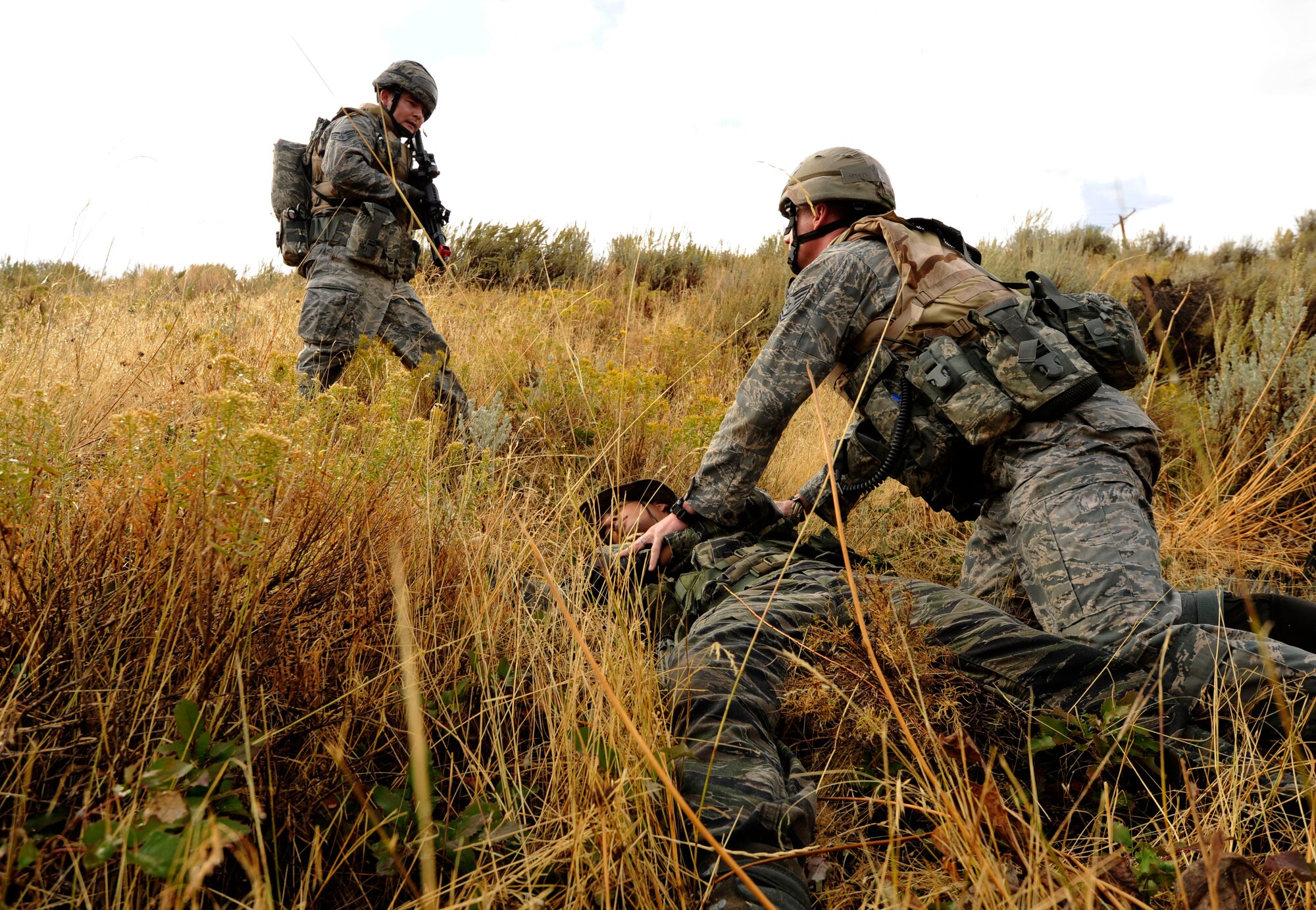 Members of the 419th Security Forces Squadron search a fatally wounded "insurgent" during Operational Readiness Exercise 10-4 at Hill Air Force Base, Utah, Oct. 7, 2010.  The exercise will prepare Airmen for an upcoming inspection.  (U.S. Air Force photo/Airman 1st Class Devin Doskey)