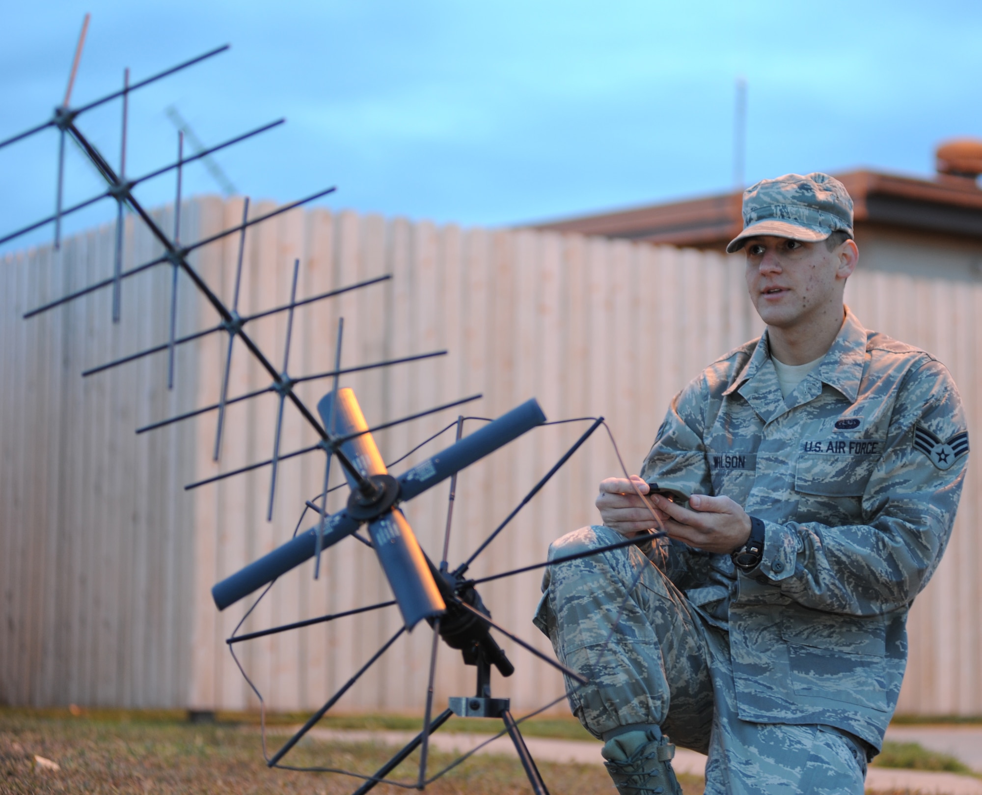 Senior Airman James Wilson, 22nd Operations Group KC-135 Stratotanker special operations communications technician, sets up a secure network antenna Oct. 19, 2010, McConnell Air Force Base, Kan. Airman Wilson began his career as a communications squadron troop but transferred to the operations group a year into his career. The Panama City, Fla., native now supports the 22nd OG by setting up secure network operations for flying operations. 