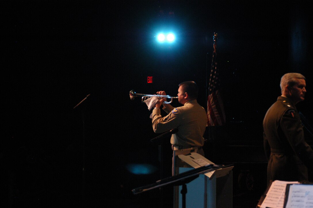 Master Sergeant Tim Allums performs "What a Wonderful World", which was made famous by the great trumpeter Louis Armstrong. Sergeant Allums had the crowd on its feet in applause with his uncanny ability to imitate the great "Satchmo".