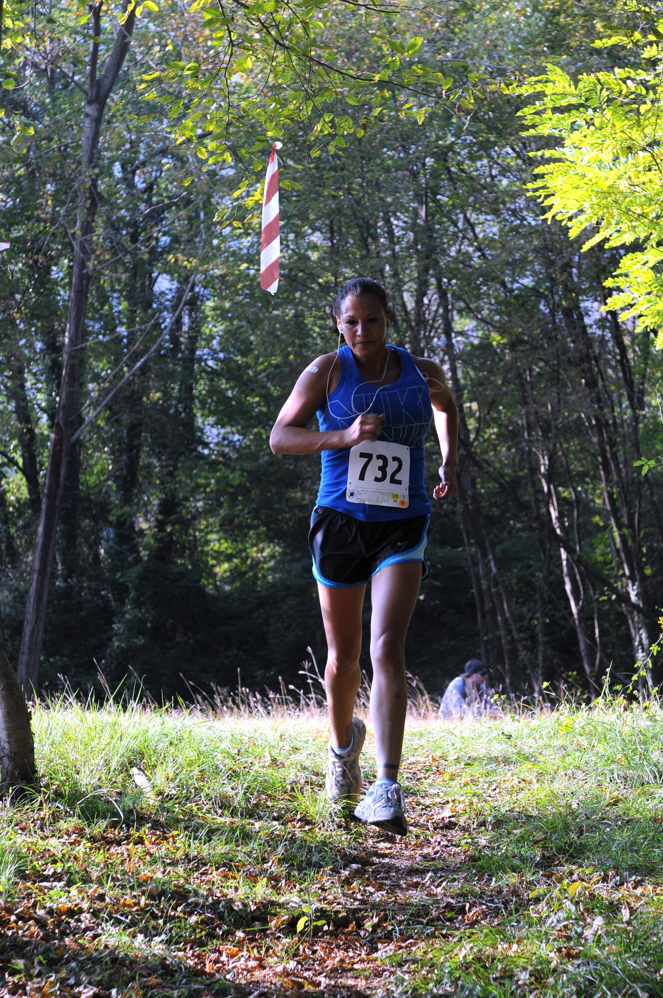 Lynette Cullins, 31st Operations Support Squadron, runs the women's 5 km course of the 2010 U.S. Air Forces in Europe Cross-Country Central Region Championships Oct. 15 at Madonna Del Monte, Aviano, Italy. (U.S. Air Force photo/Staff Sgt. Julius Delos Reyes)